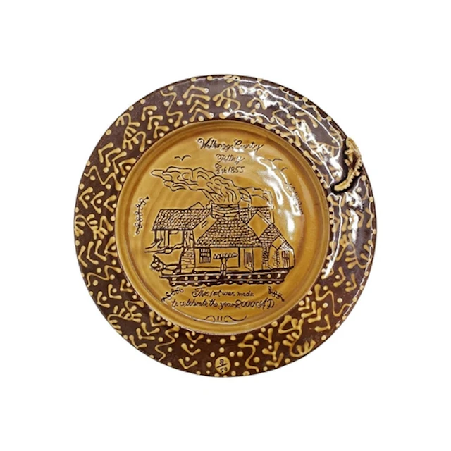Wetheriggs Pottery, Penrith - A large 2000 slipware earthenw...