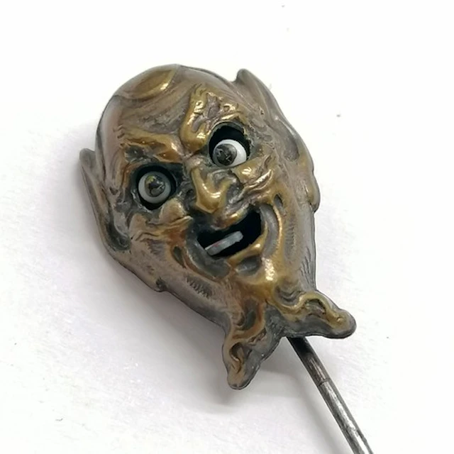 Antique novelty tie pin with demons head detail and articula...