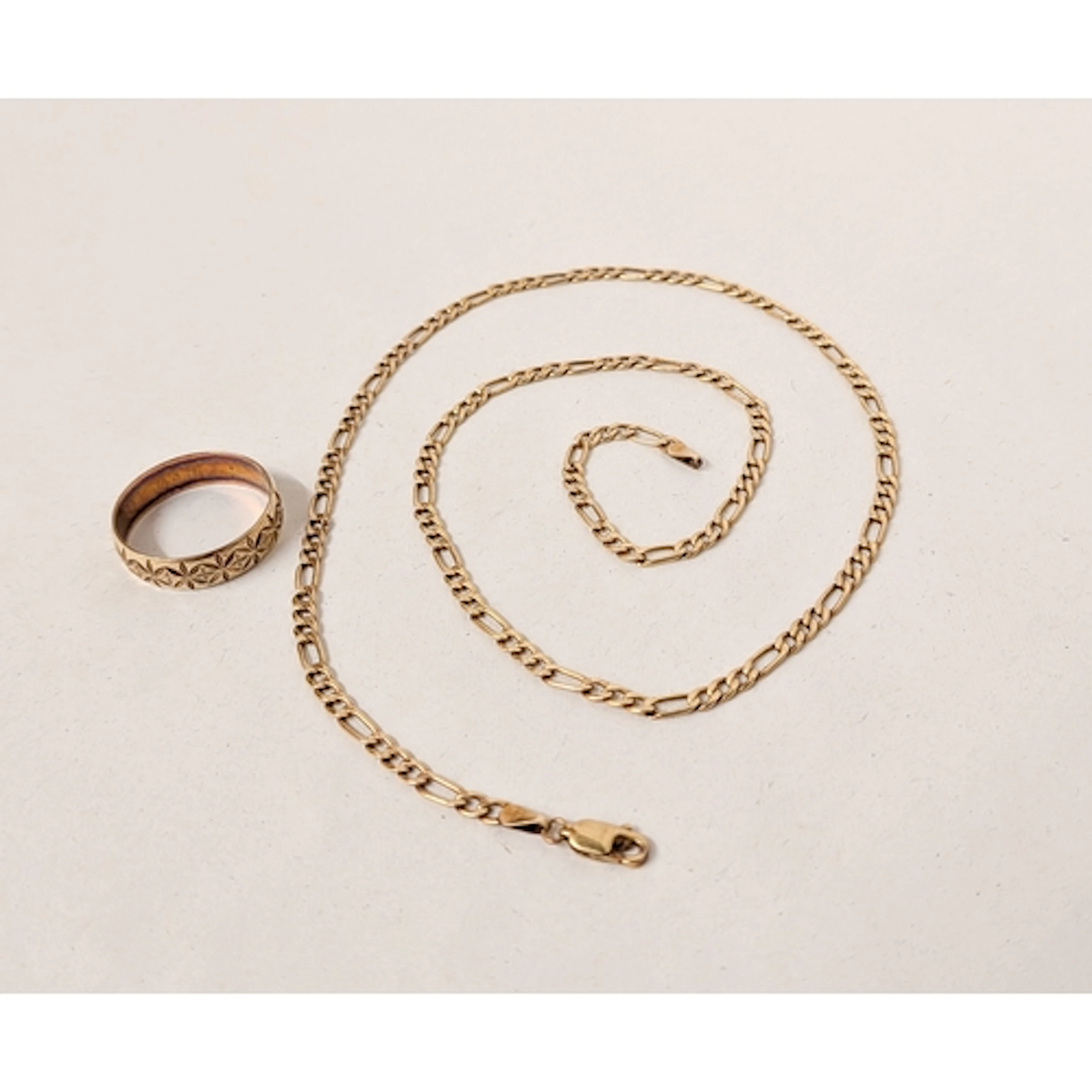 A 9ct gold figaro link neck chain, 20" long together with a ...