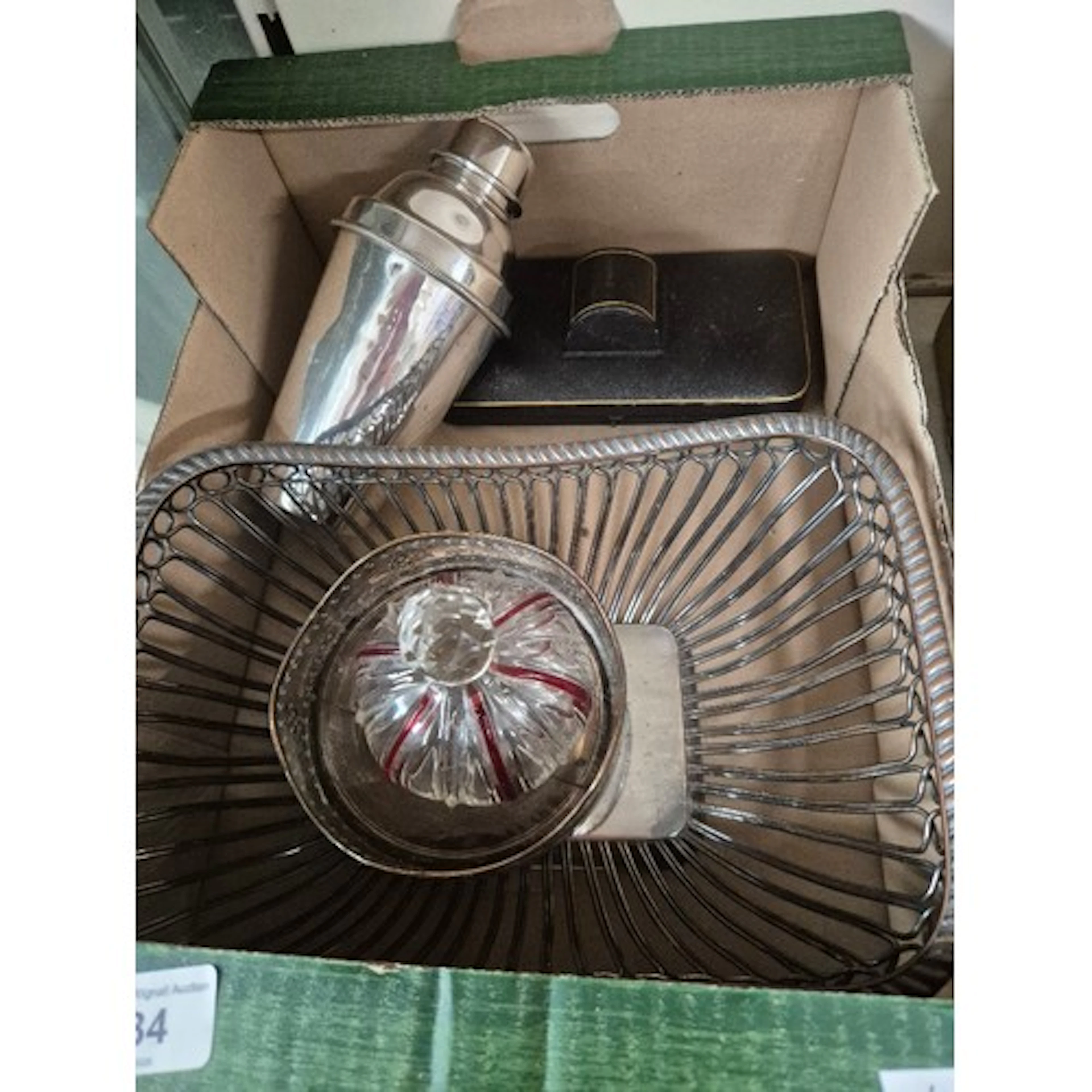 Old Sheffield plate bread basket and wine coaster, a plated ...