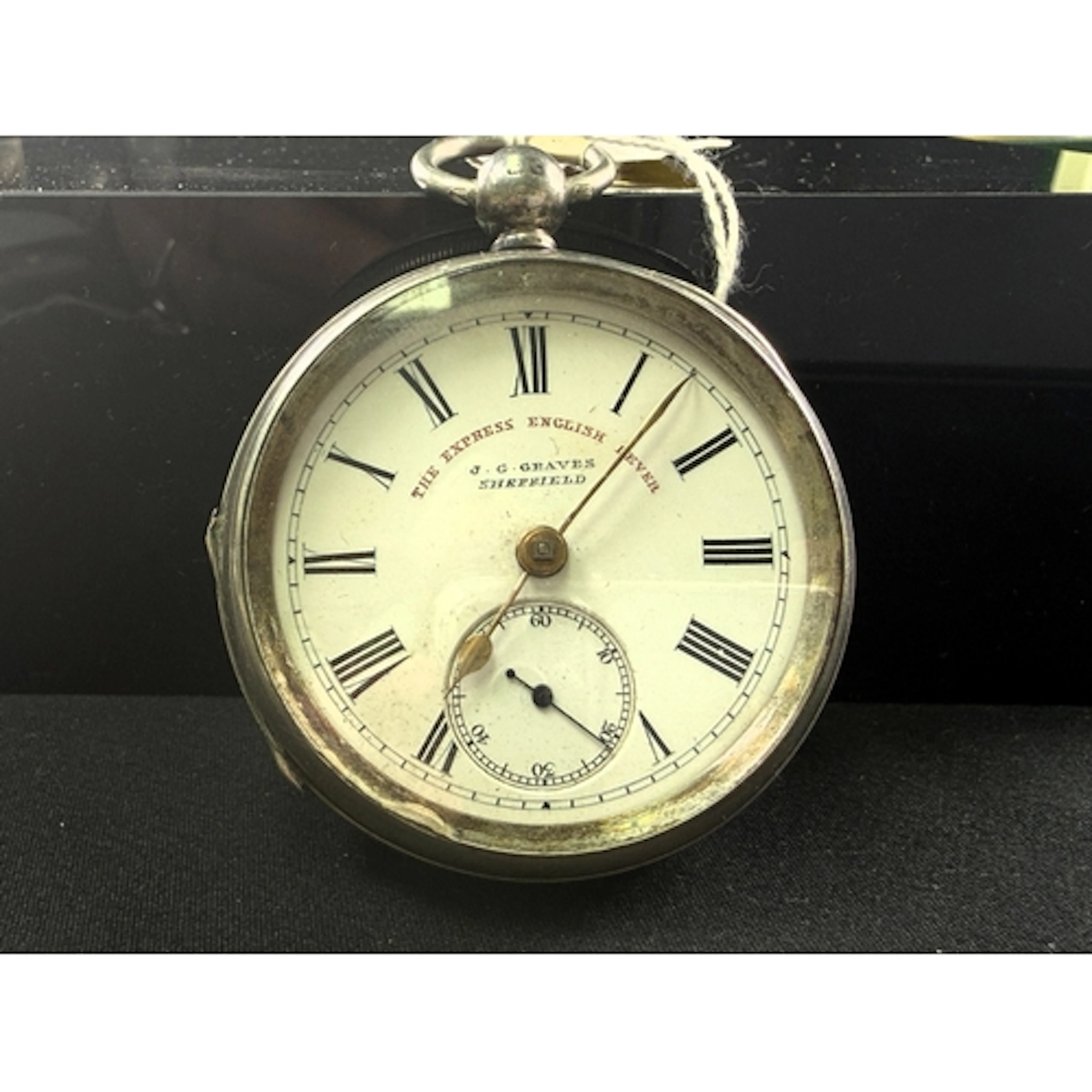 An open faced key wound pocket watch in hallmarked silver ca...