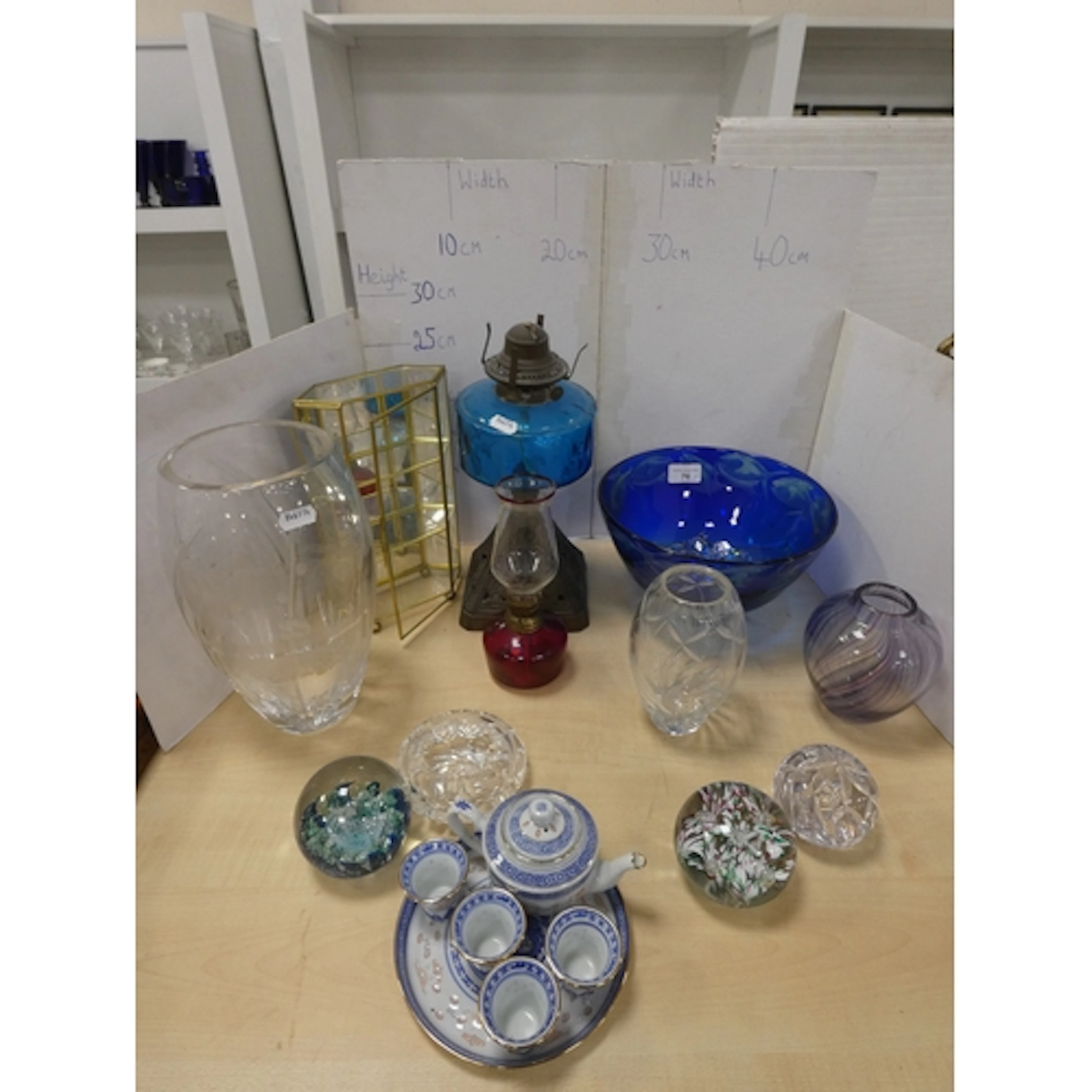 Group of art glass to include a blue glass fish decorated bo...