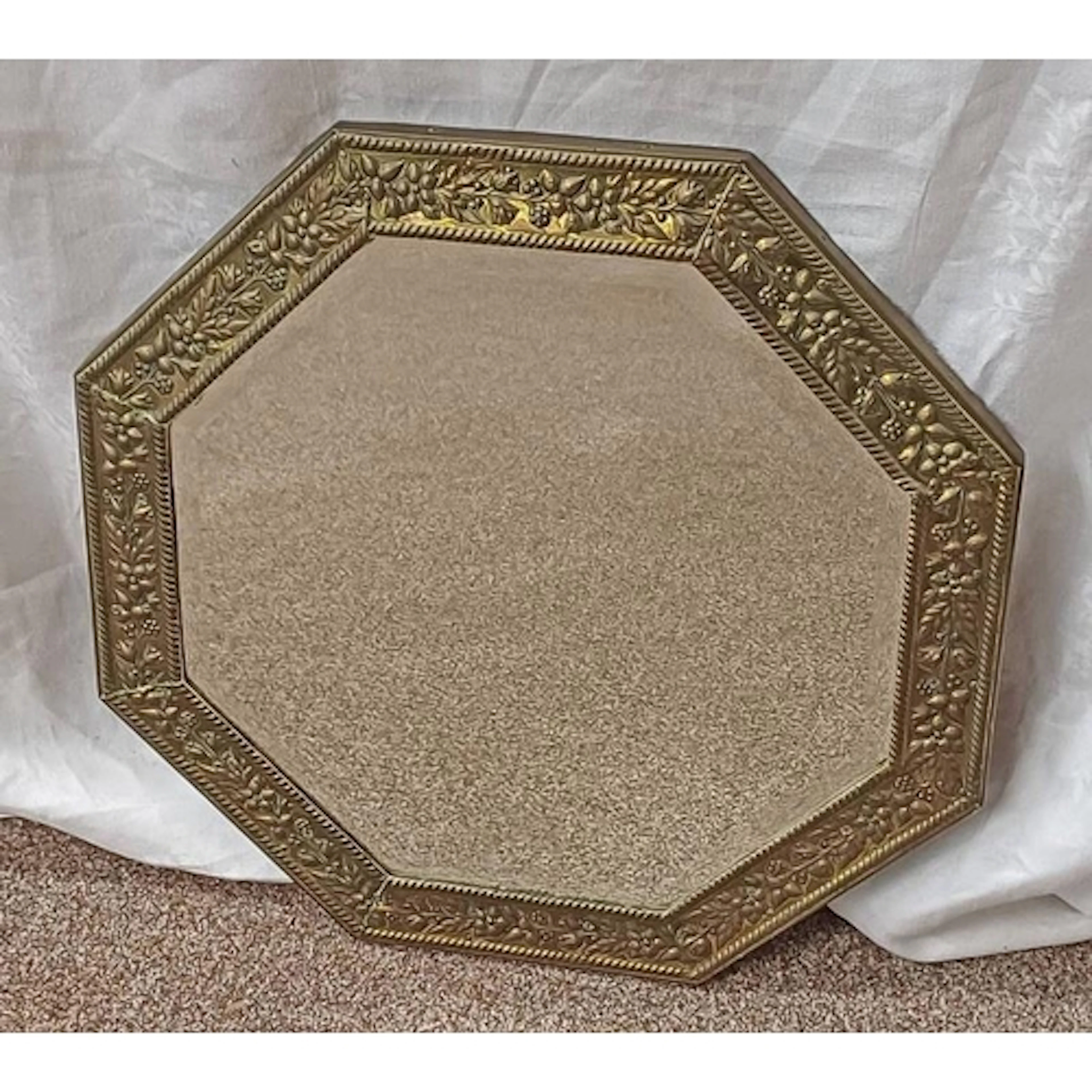 BRASS FRAMED HEXAGONAL MIRROR IN THE ARTS & CRAFTS STYLE, 34...