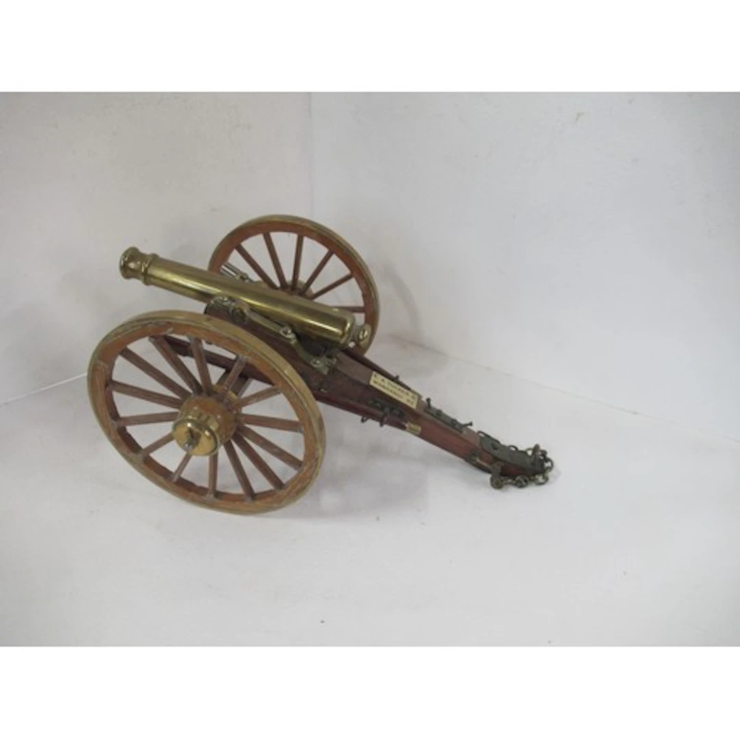 A handbuilt model of a Napoleonic era field gun, barrel leng...