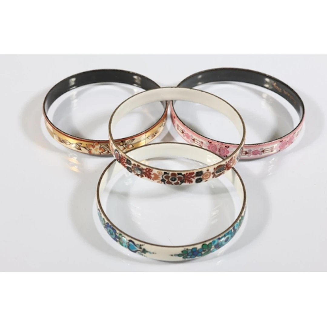 Four Austrian Michaela Frey enamelled bangles. (4)