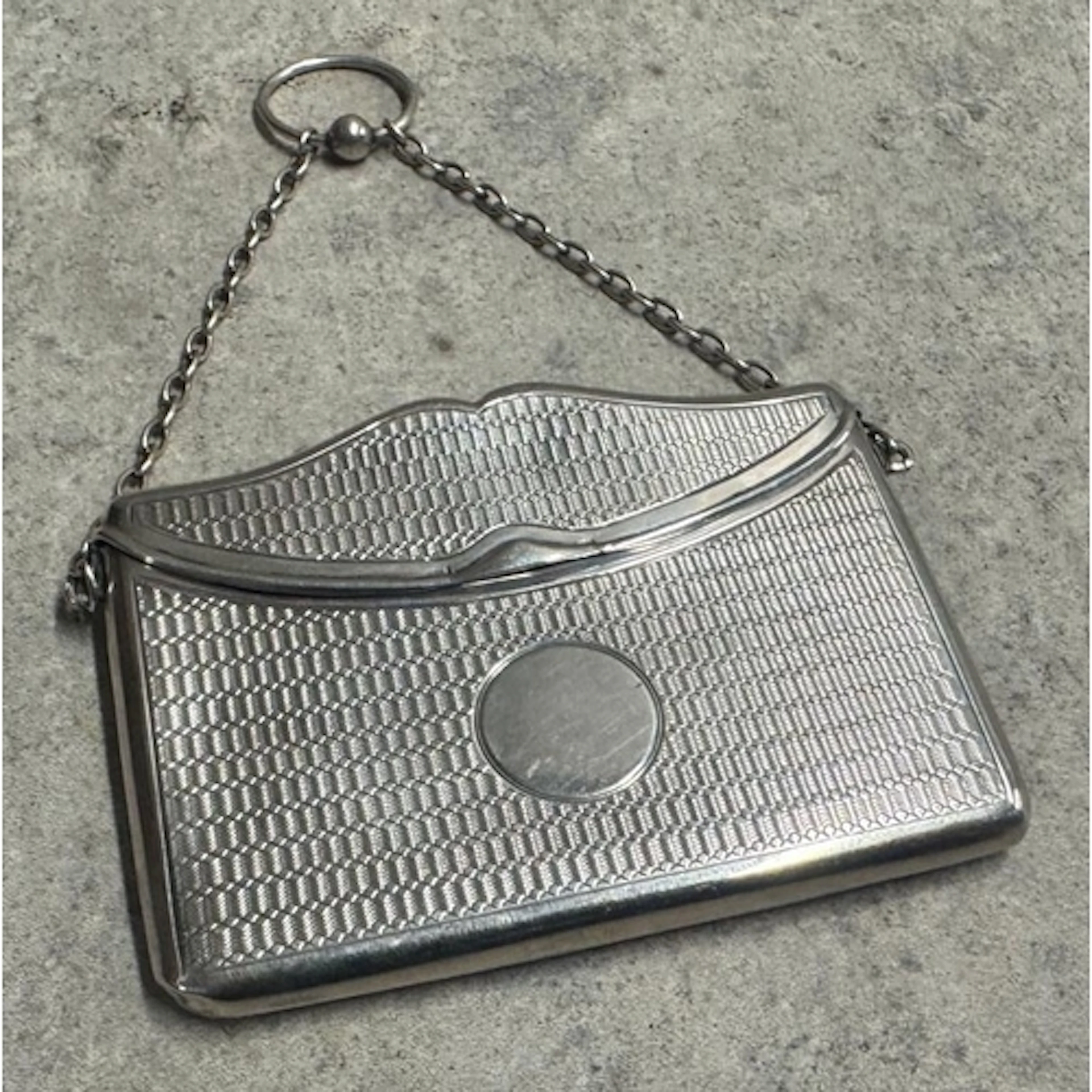 A silver card case in the form of an envelope. Birmingham 19...