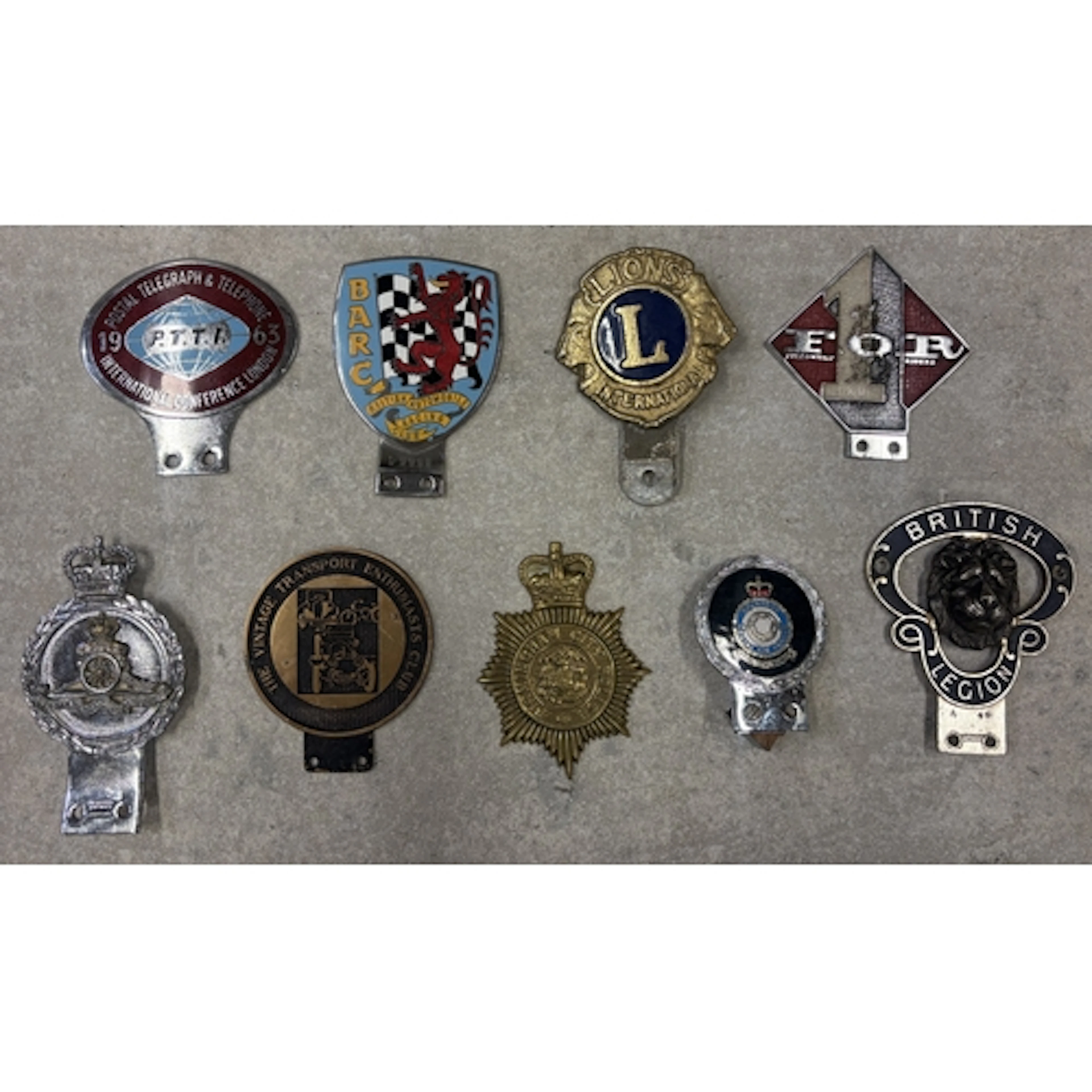 A collection of nine car badges to include Fellowship of Rid...