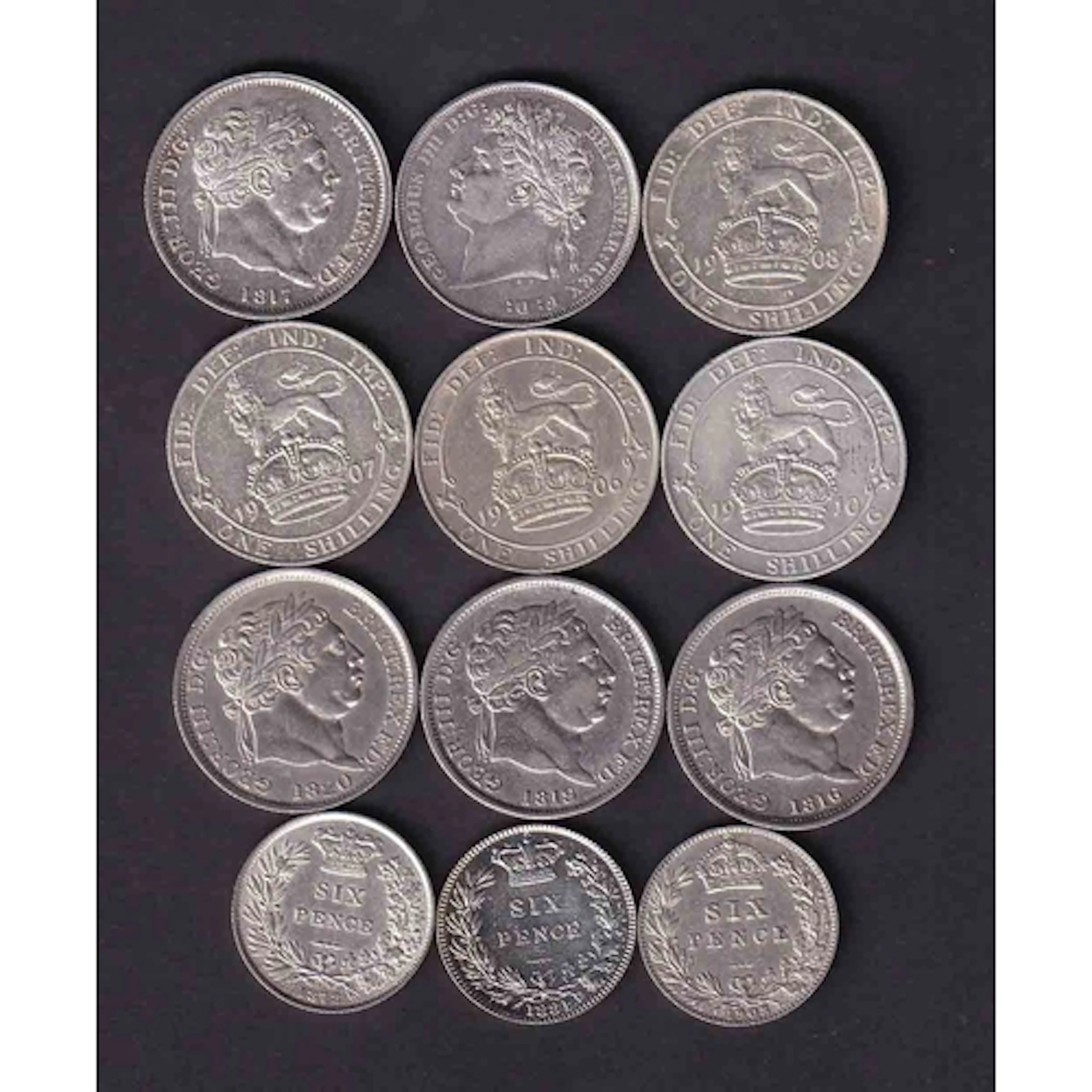 A collection of twelve Great Britain silver Shillings and Si...