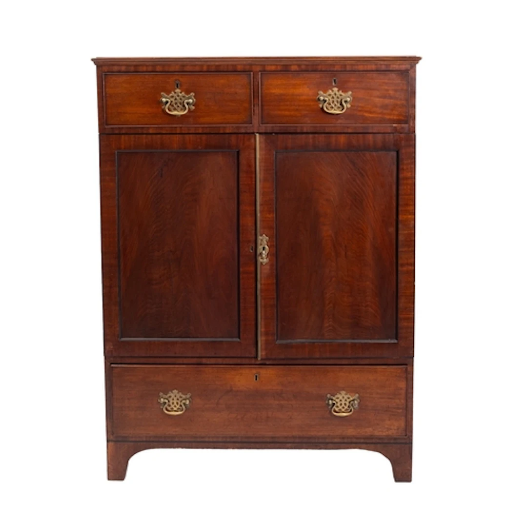 A George III mahogany dwarf linen press, late 18th century; ...