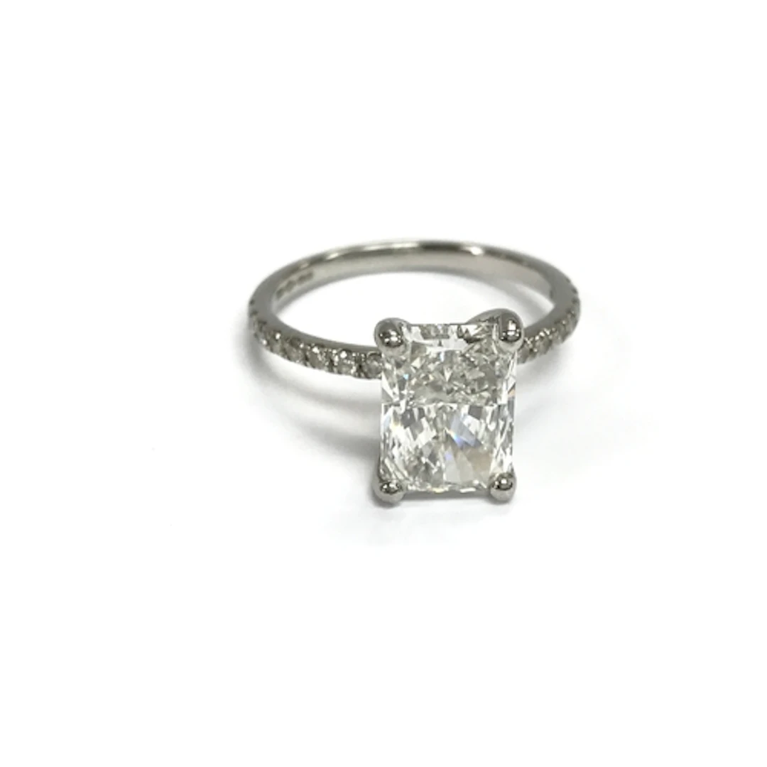 A 2.51ct diamond ring set in platinum band with further 0.21...
