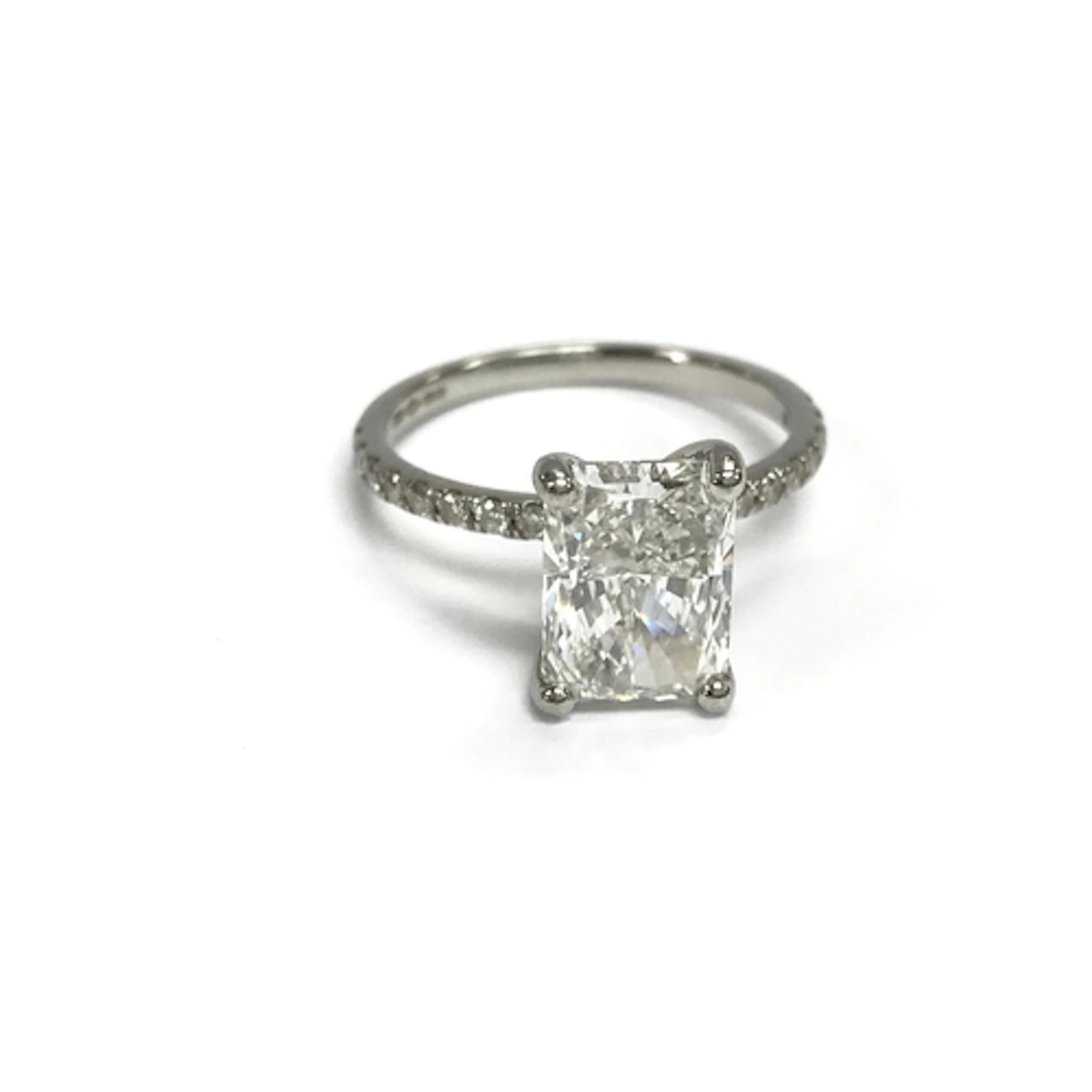 A 2.51ct diamond ring set in platinum band with further 0.21...