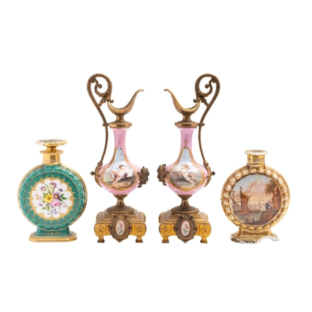 A pair of Sèvres-style gilt-spelter mounted porcelain side p...