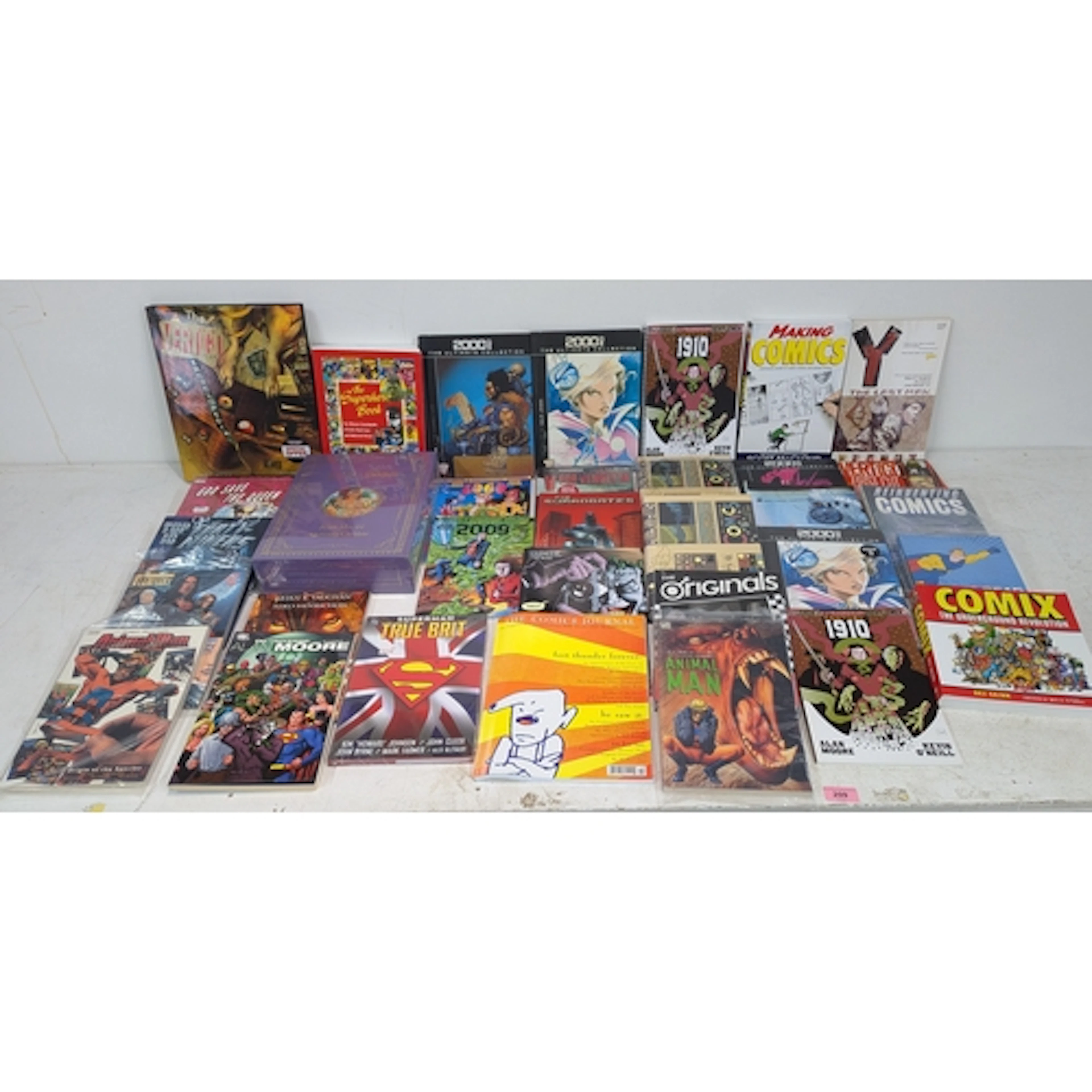 A collection of various comic books, graphic novels to inclu...