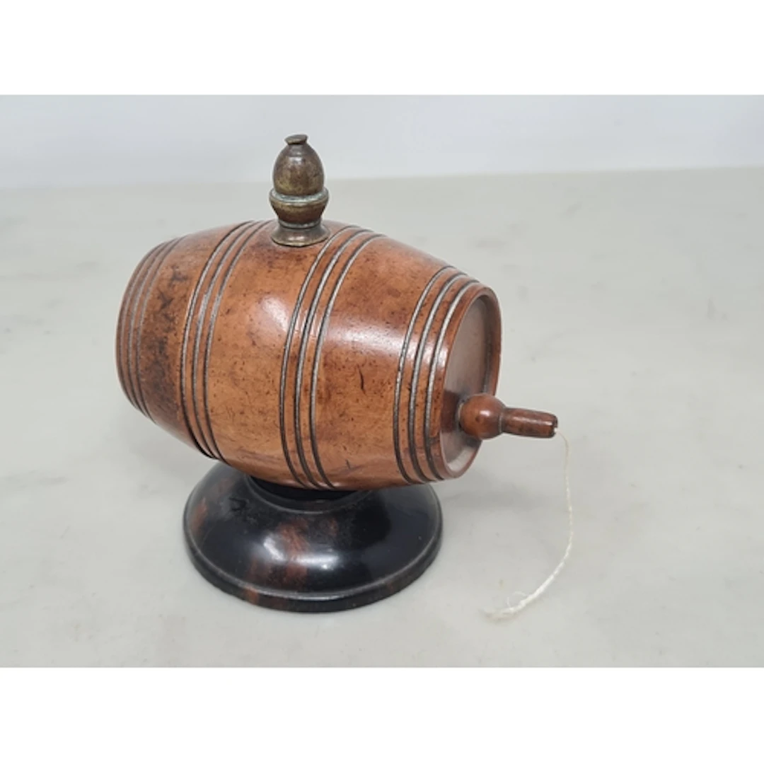 An unusual treen String Box in the form of a barrel with bra...