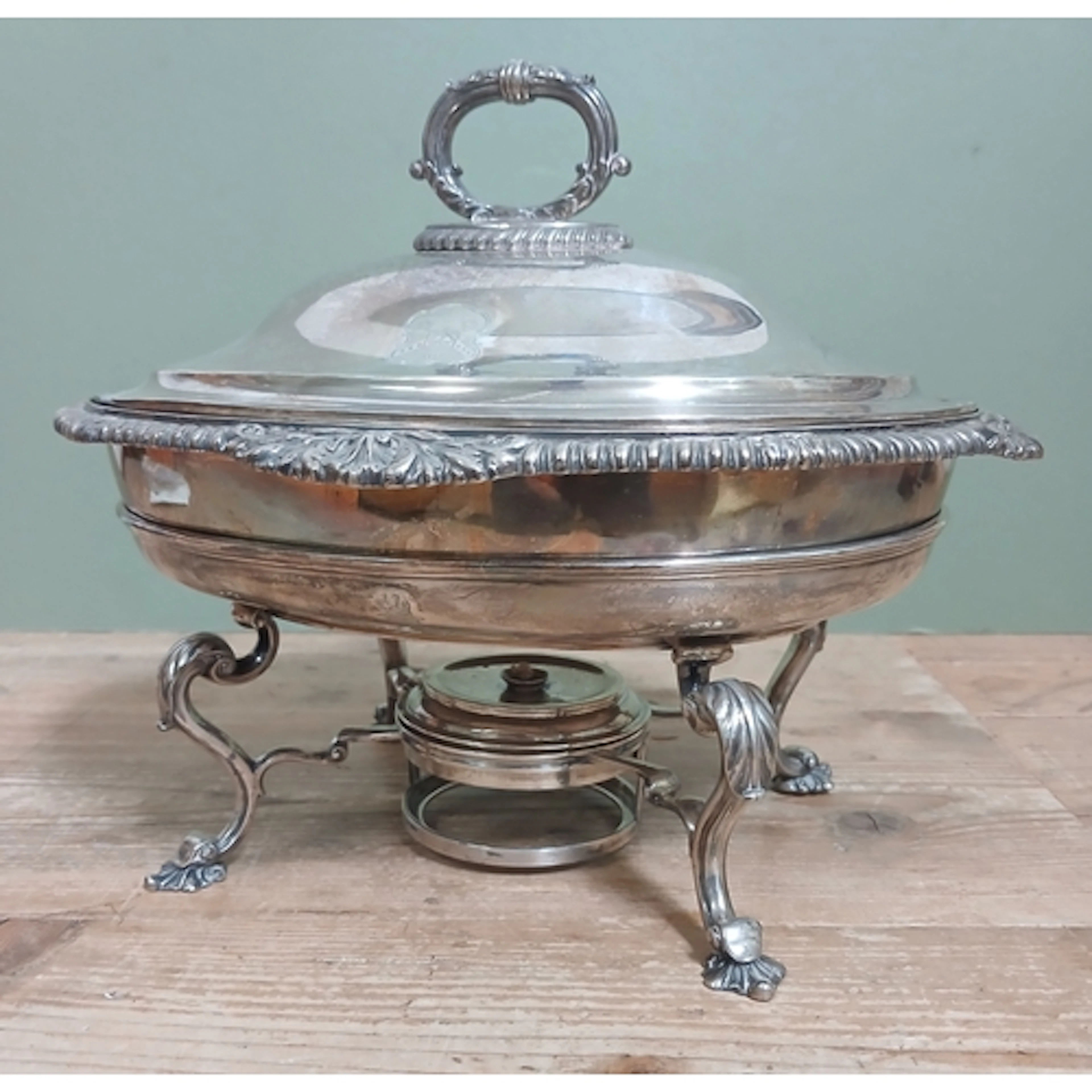 A George III Regency period silver entree dish with stand an...