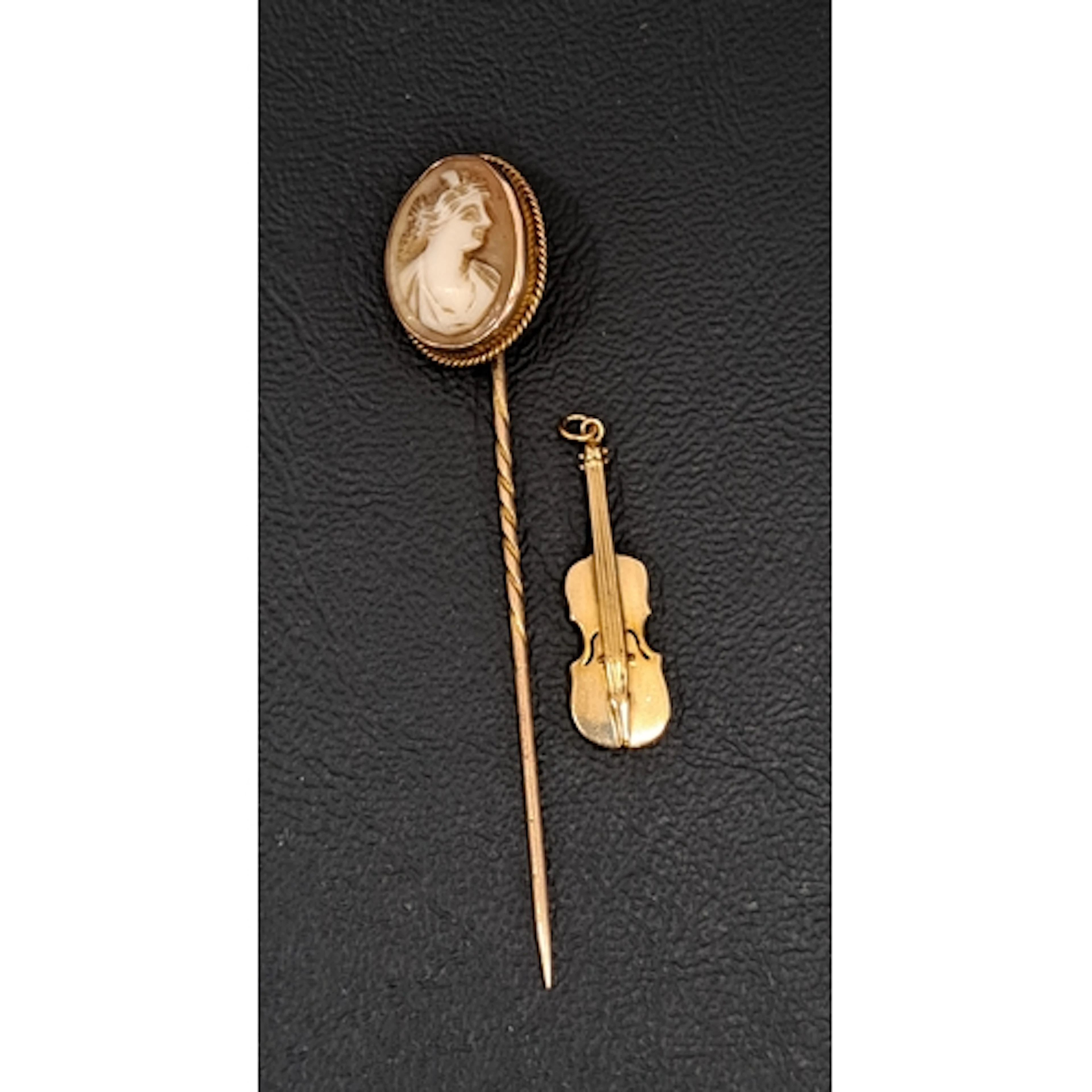 CAMEO STICK PIN in unmarked gold mount, 7cm long and approxi...