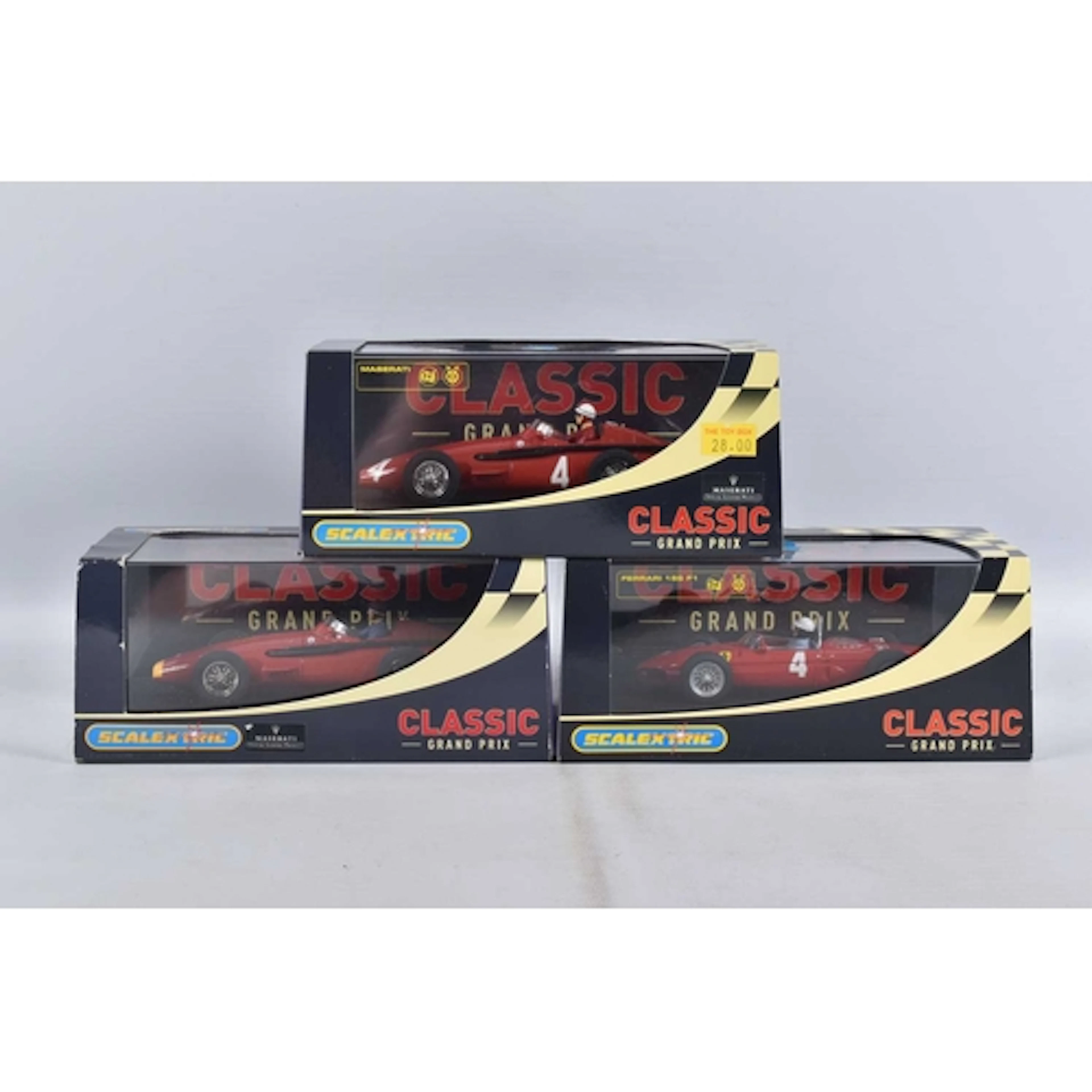 THREE CASED SCALEXTRIC CLASSIC MODEL SLOT CARS, to include a...