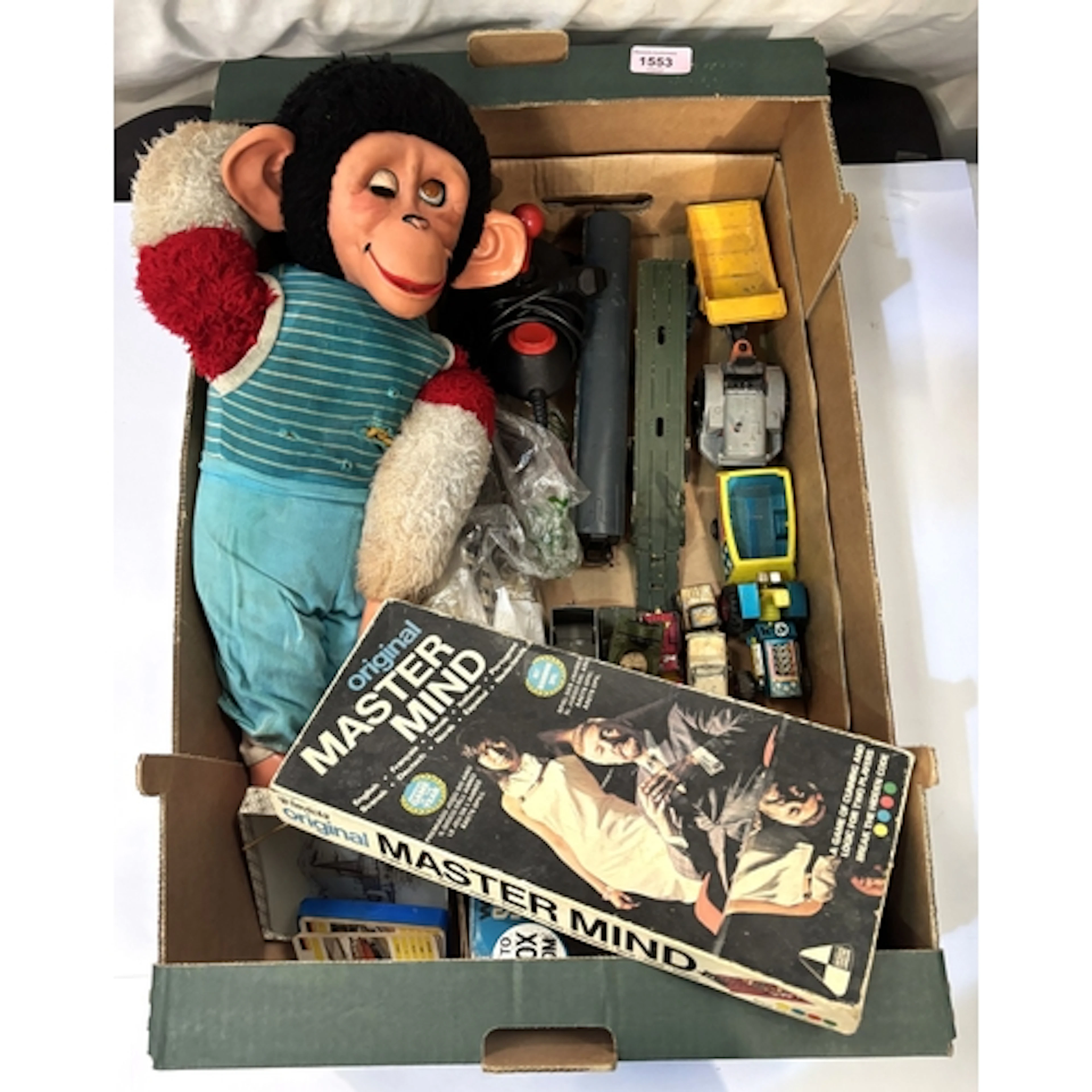 A collection of vintage toys, vintage monkey, diecast vehicl...