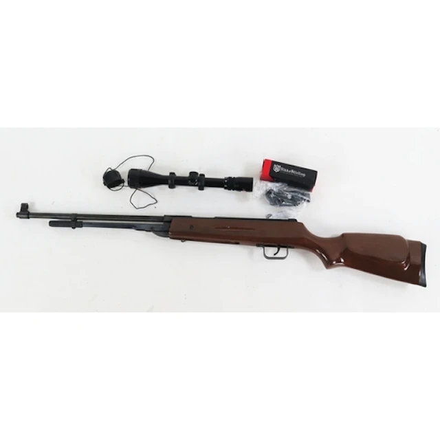 A BMM .22 calibre air rifle, with telescopic sight, etc. WE...