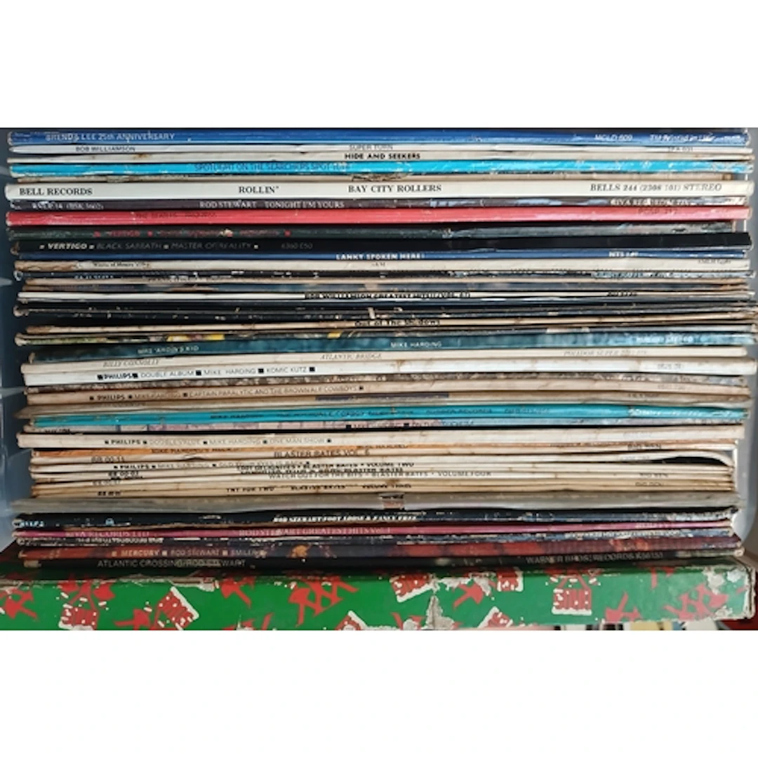 A box of assorted LPs including Black Sabbath and The Beatle...