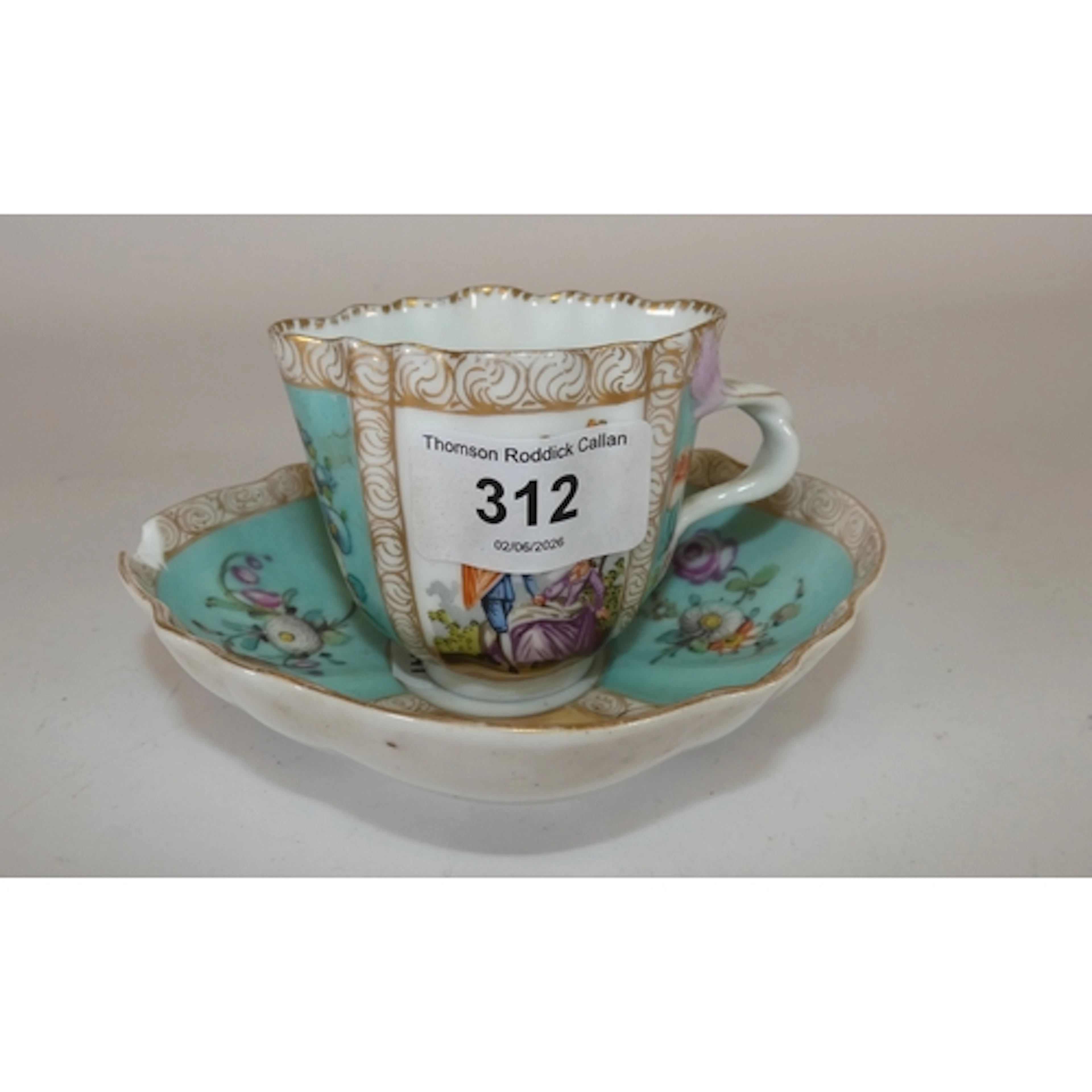 Continental porcelain quatrefoil cup with saucer, in the man...