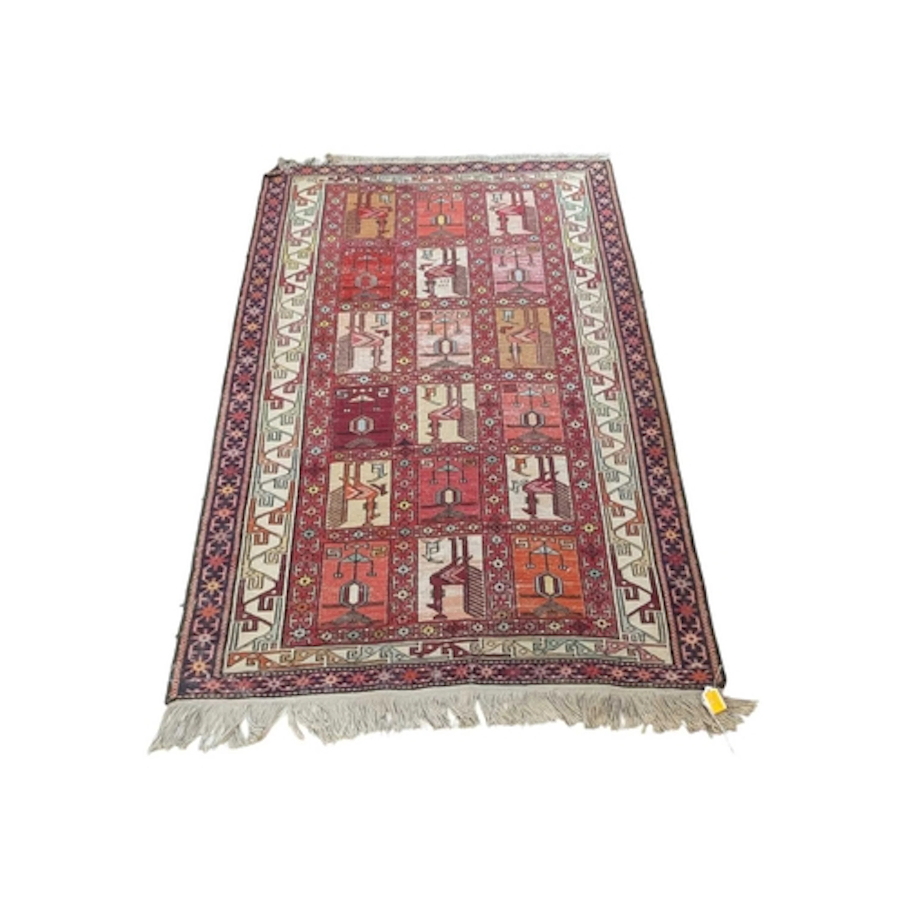 A 20th century Turkish Samouk wool knotted rug. The rug havi...