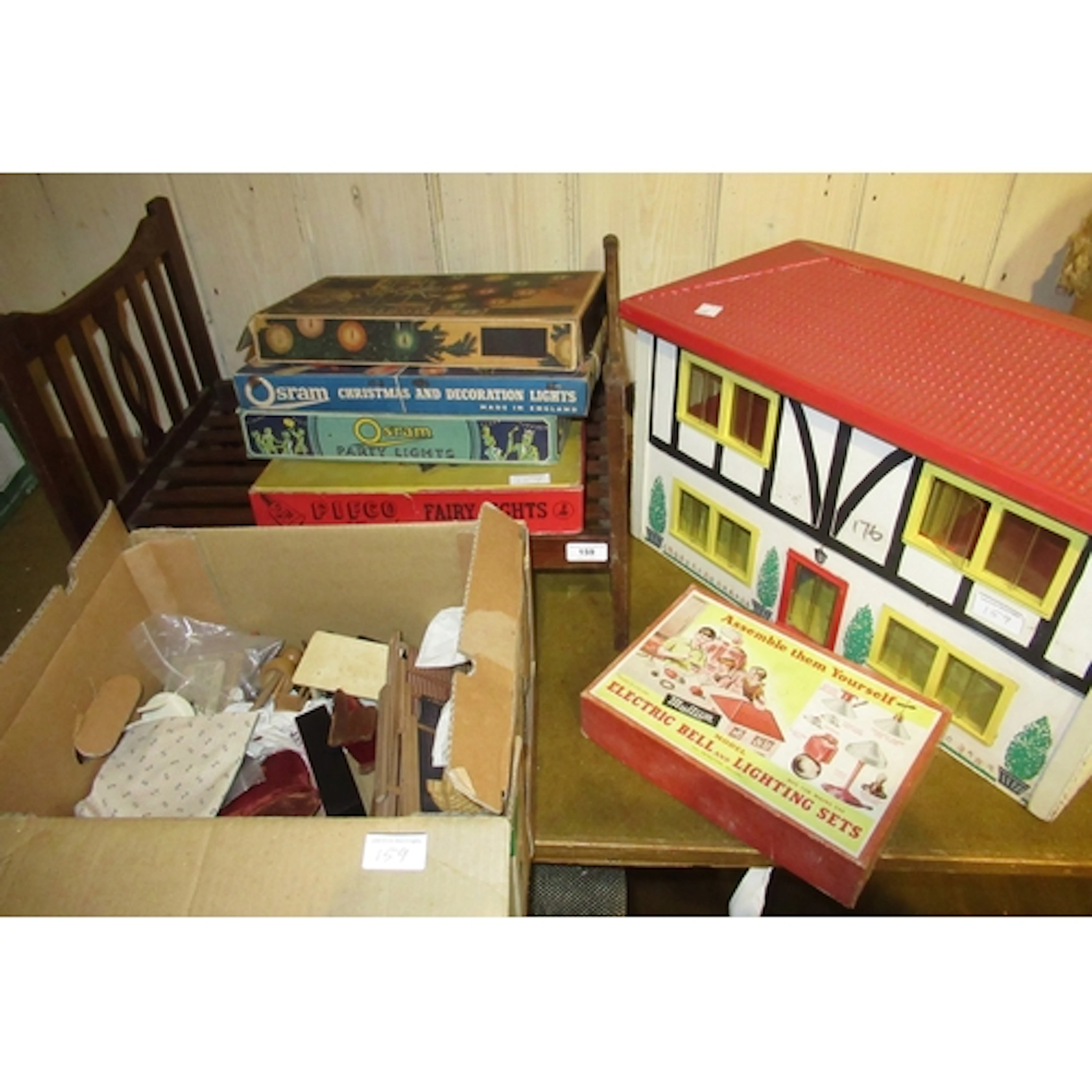 Late 19th / early 20th Century doll, four boxes of Osram par...