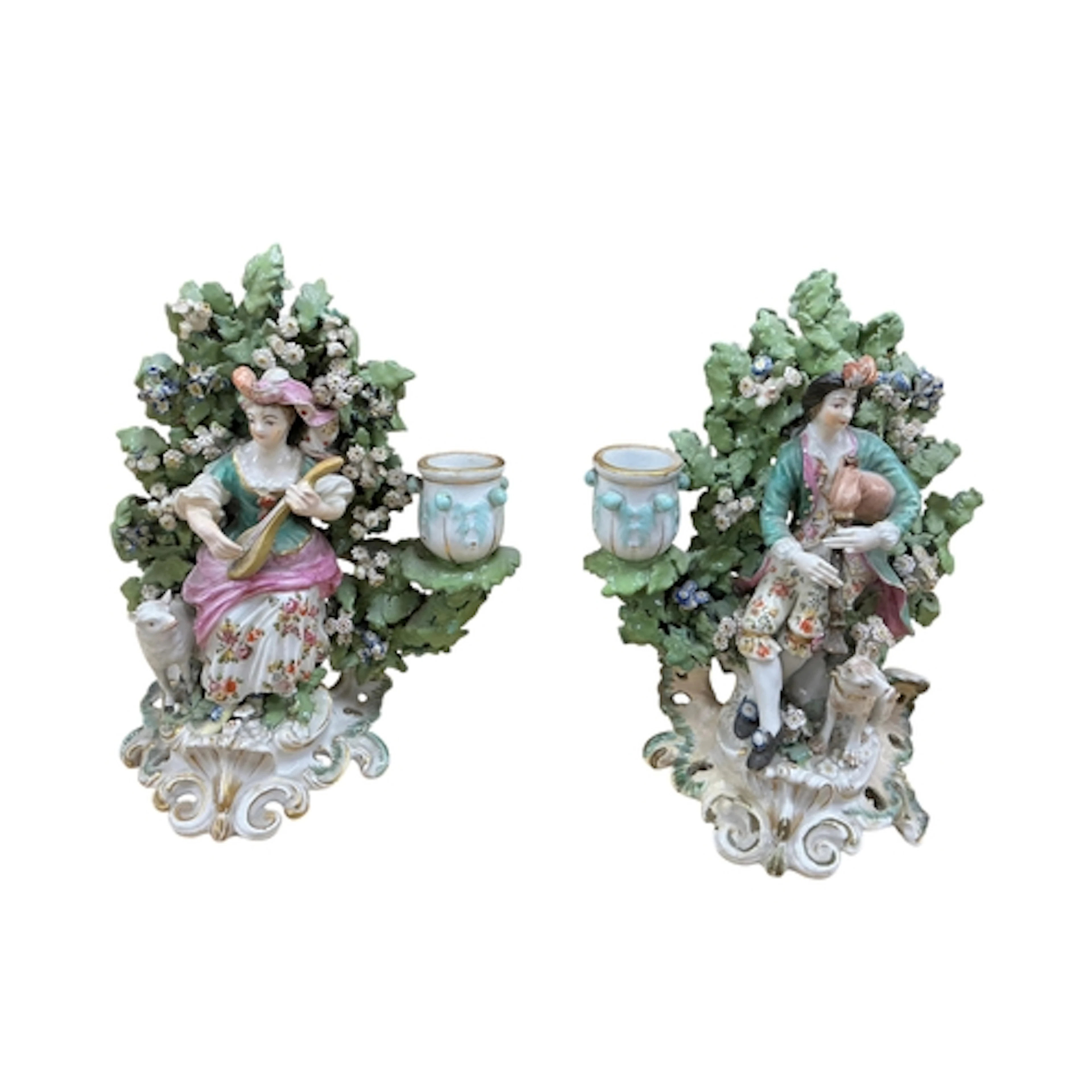 A pair of 18th century Derby musician candlestick figures c....