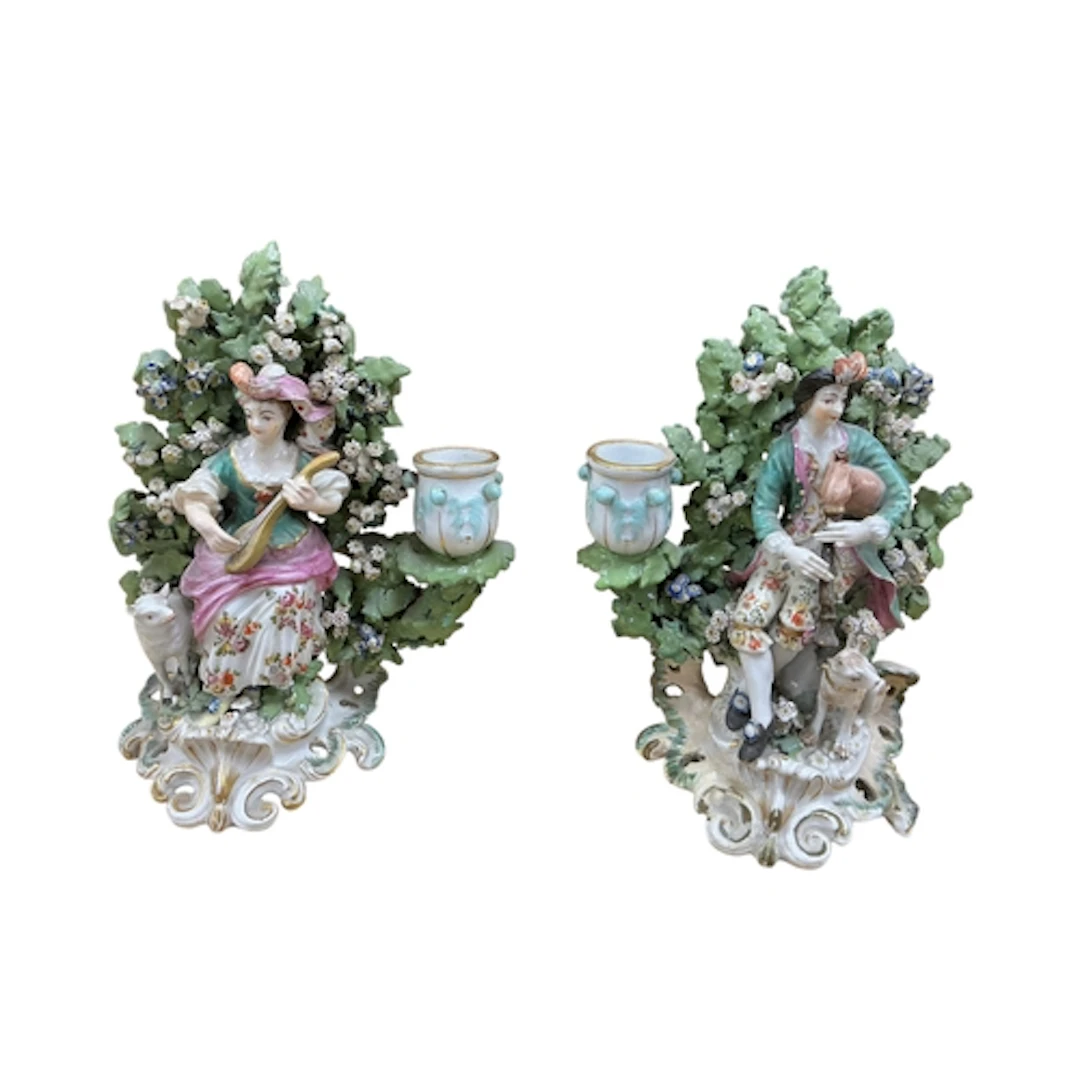 A pair of 18th century Derby musician candlestick figures c....
