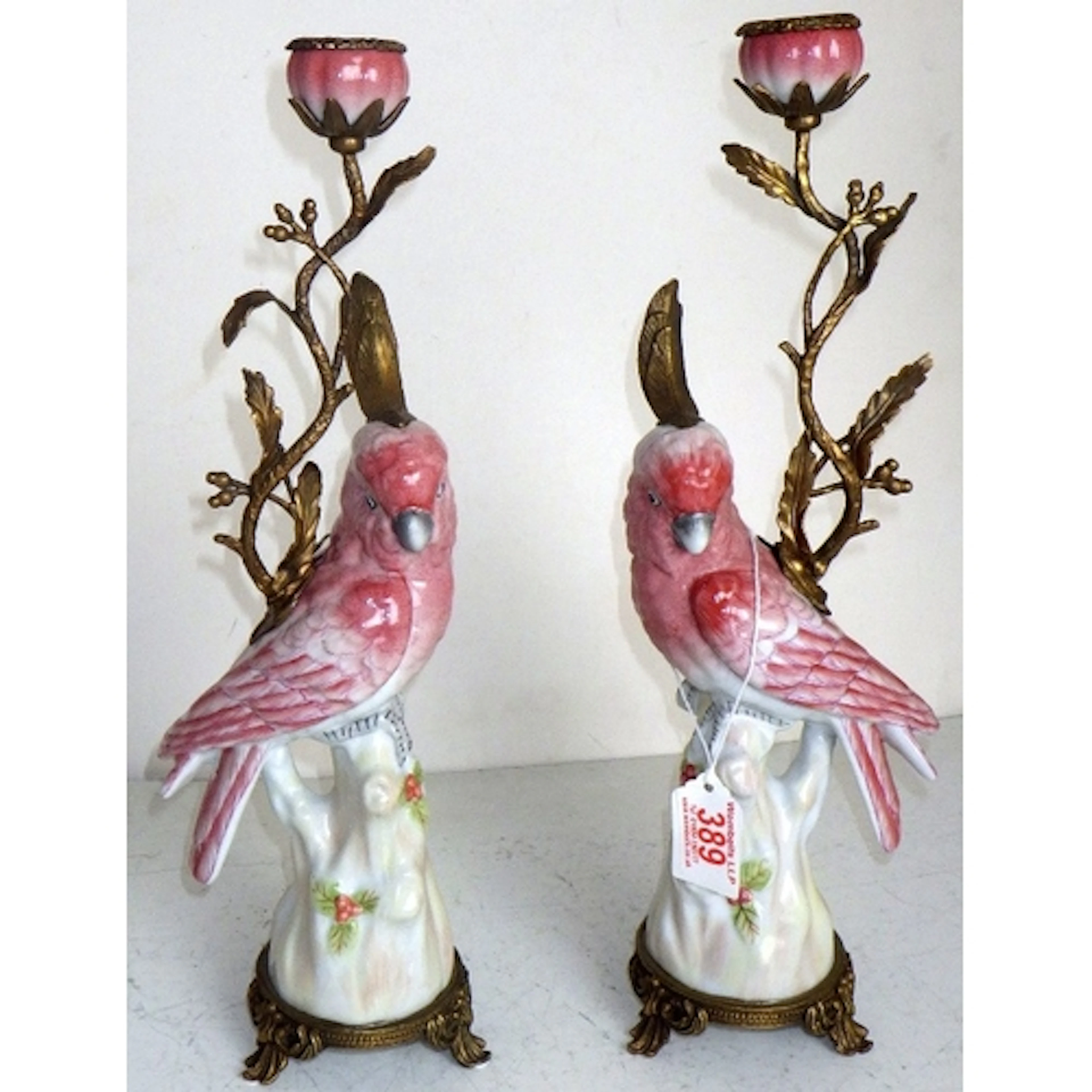 A pair of porcelain & bronze pink parrot candlesticks, 42cm ...