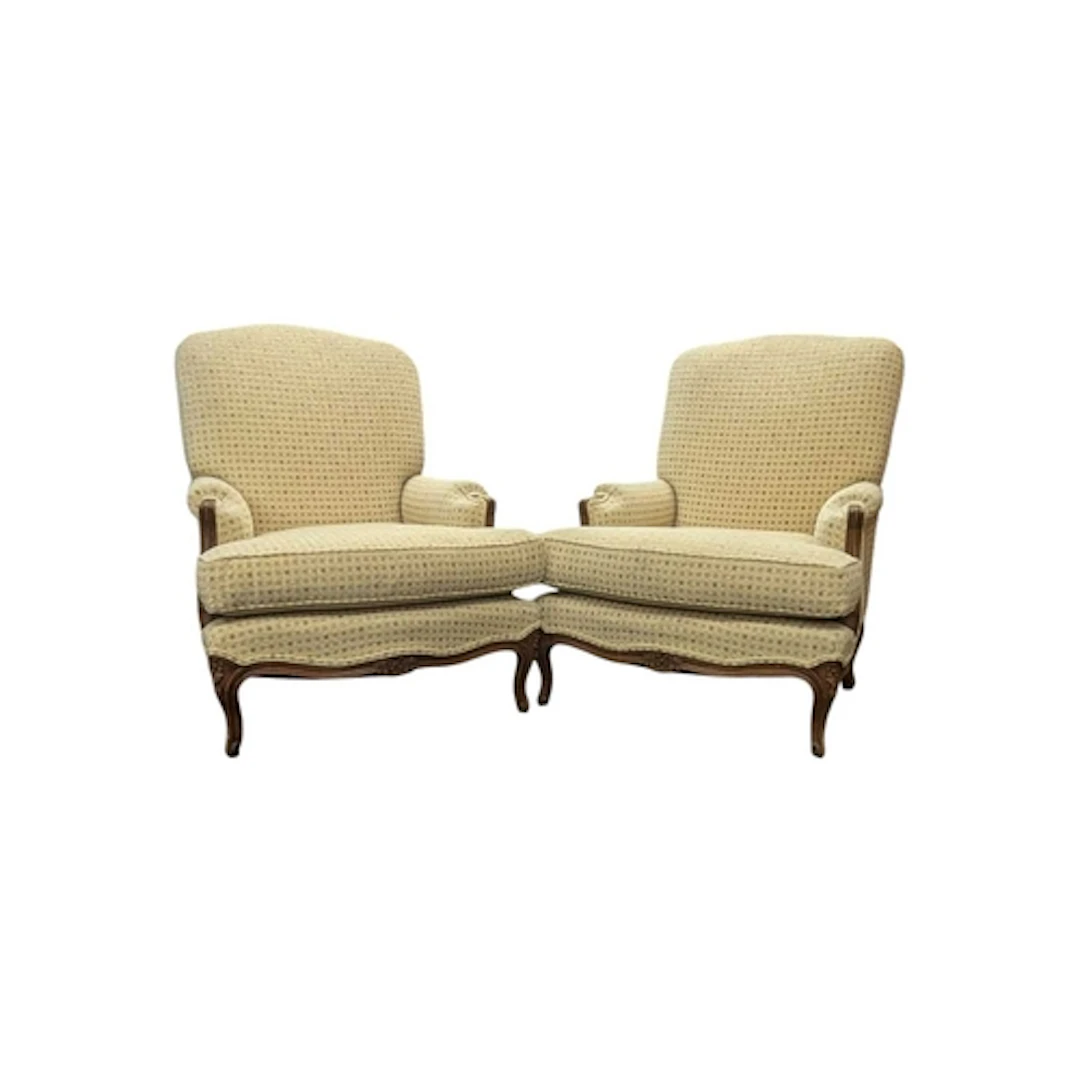 A pair of French Louis XV inspired walnut framed & uphol...