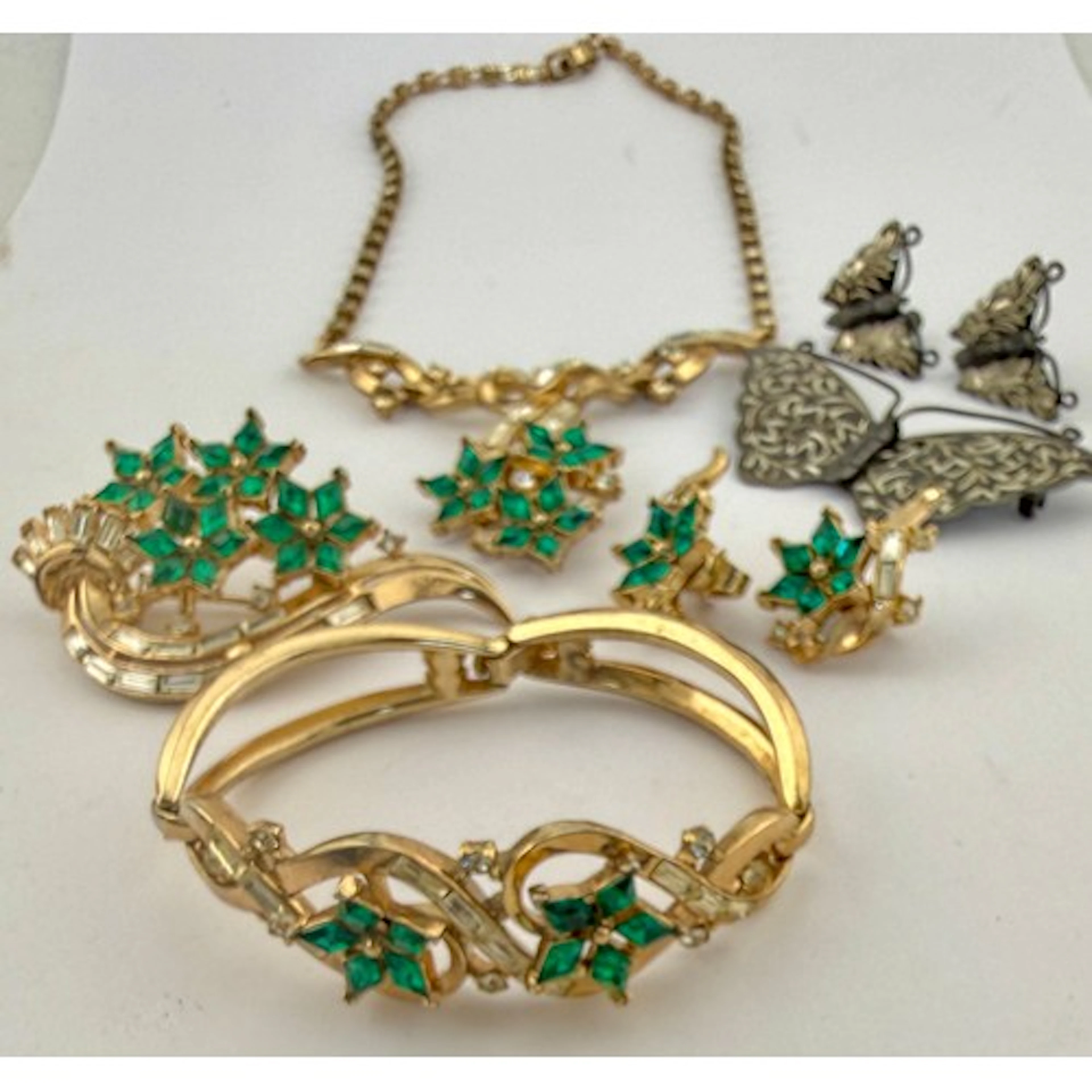 A Trifari bracelet, earrings, necklace and brooch together w...