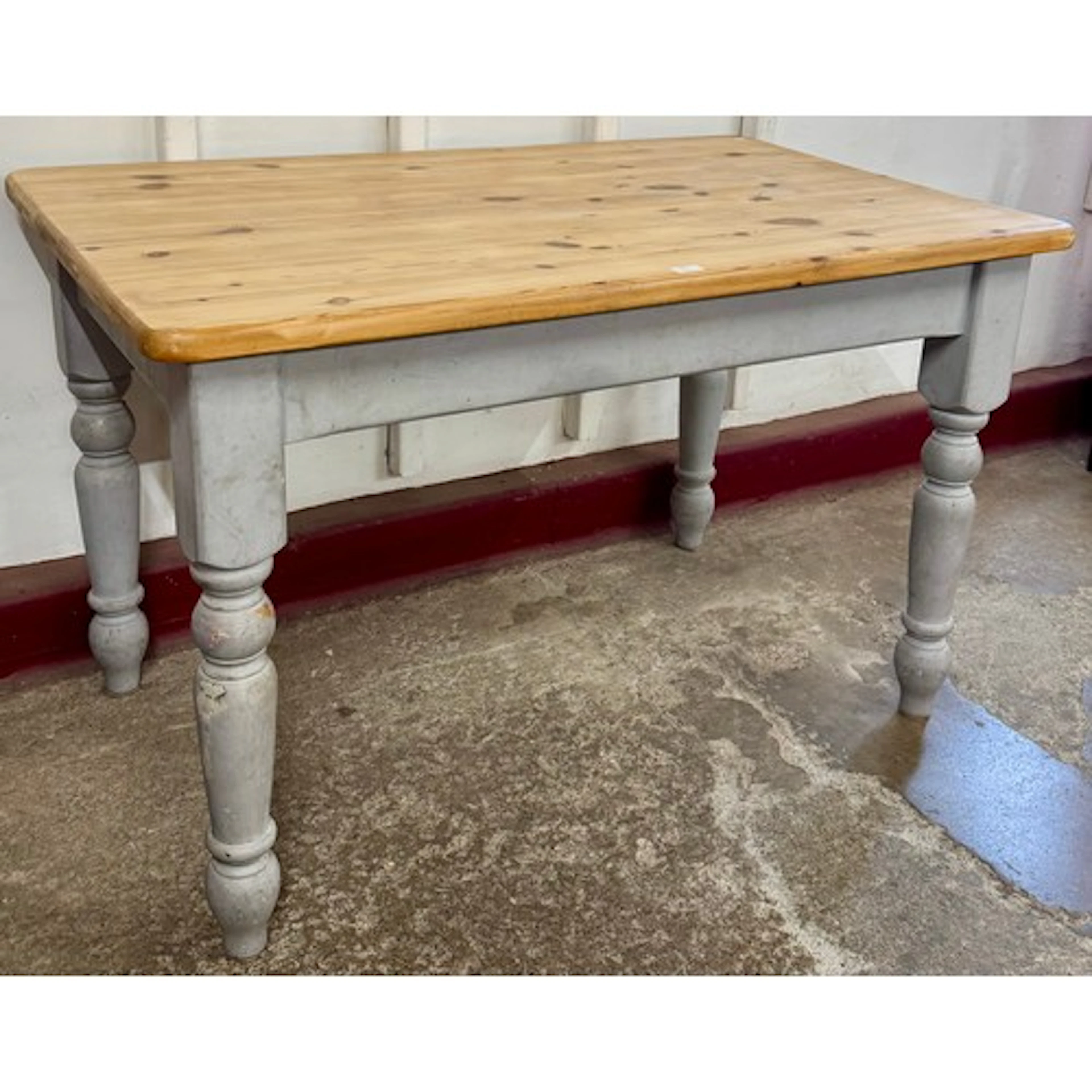 A Victorian style pine kitchen table