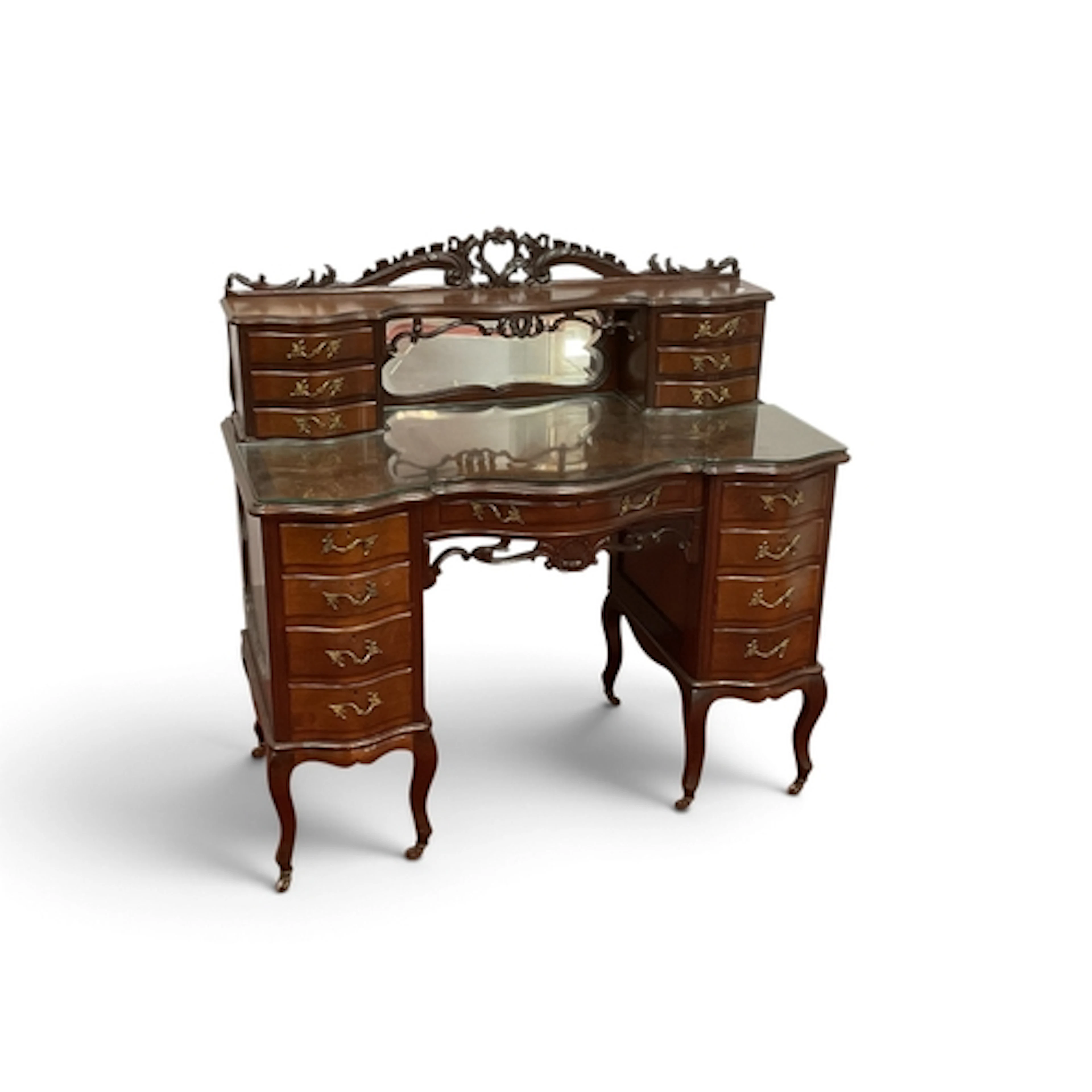 An Early XX Century Mahogany Serpentine Shaped Dressing Tabl...