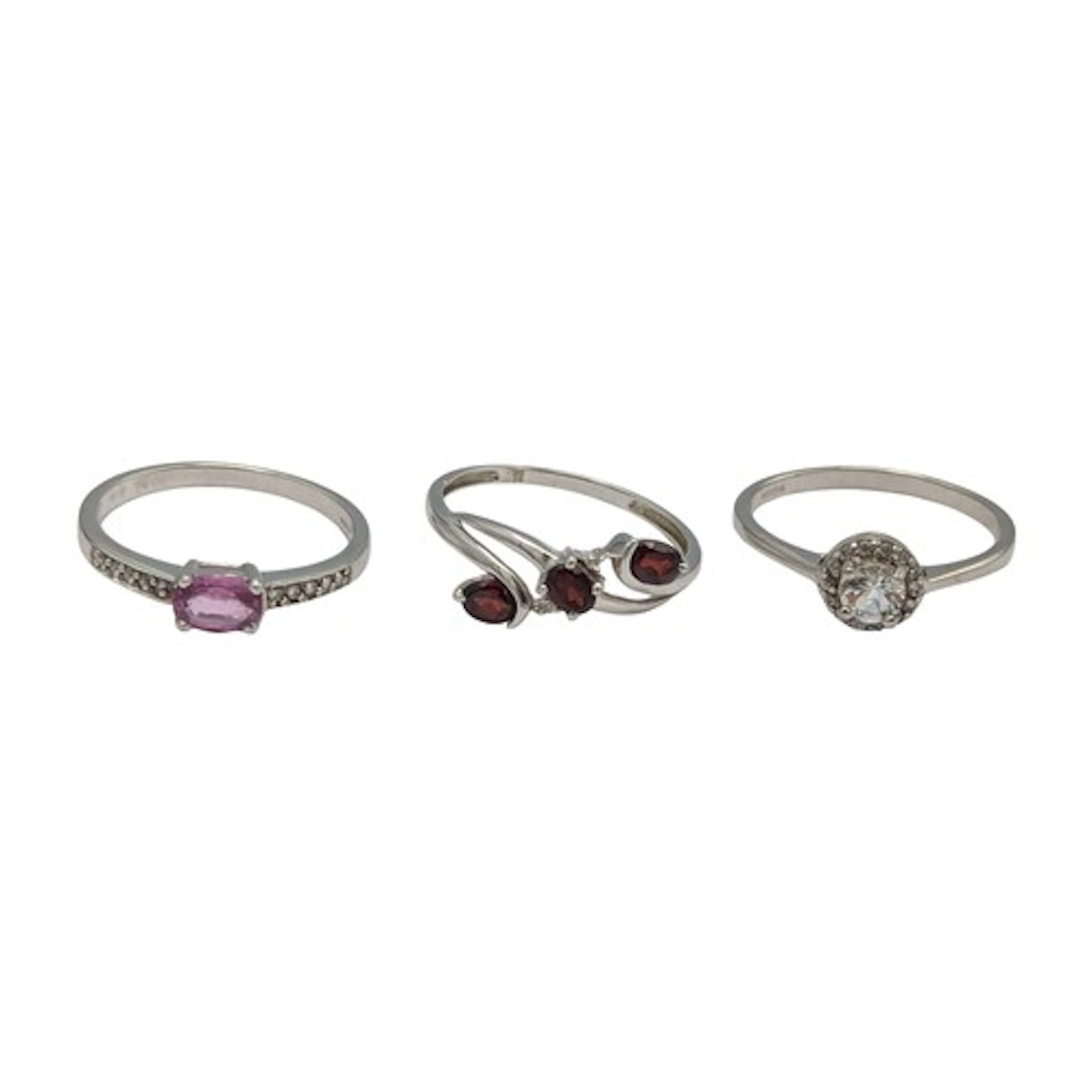 A 9ct white gold pale pink and white sapphire ring, size O; ...