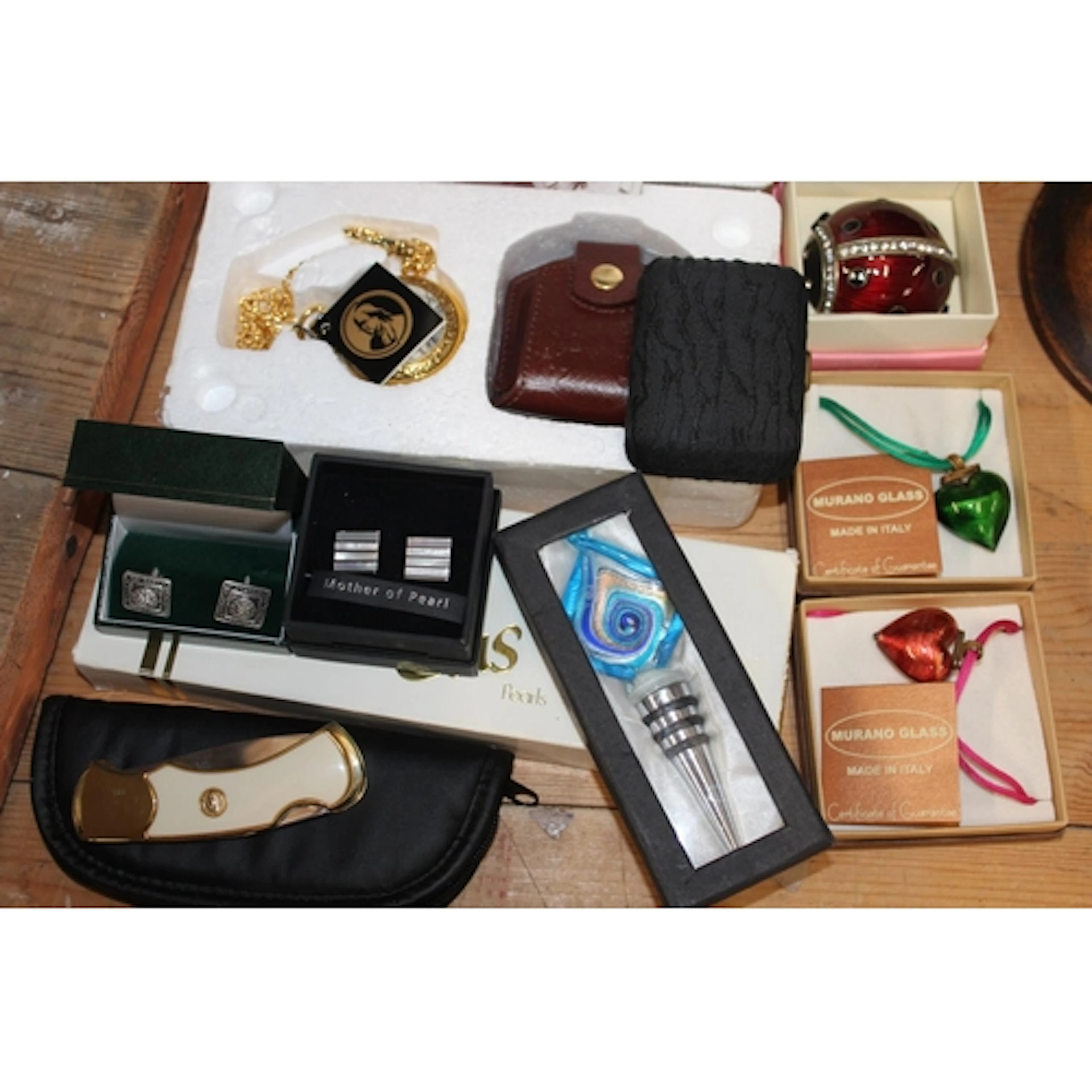 Rainbow trout pocket watch, a Franklin Mint knife, cufflinks...