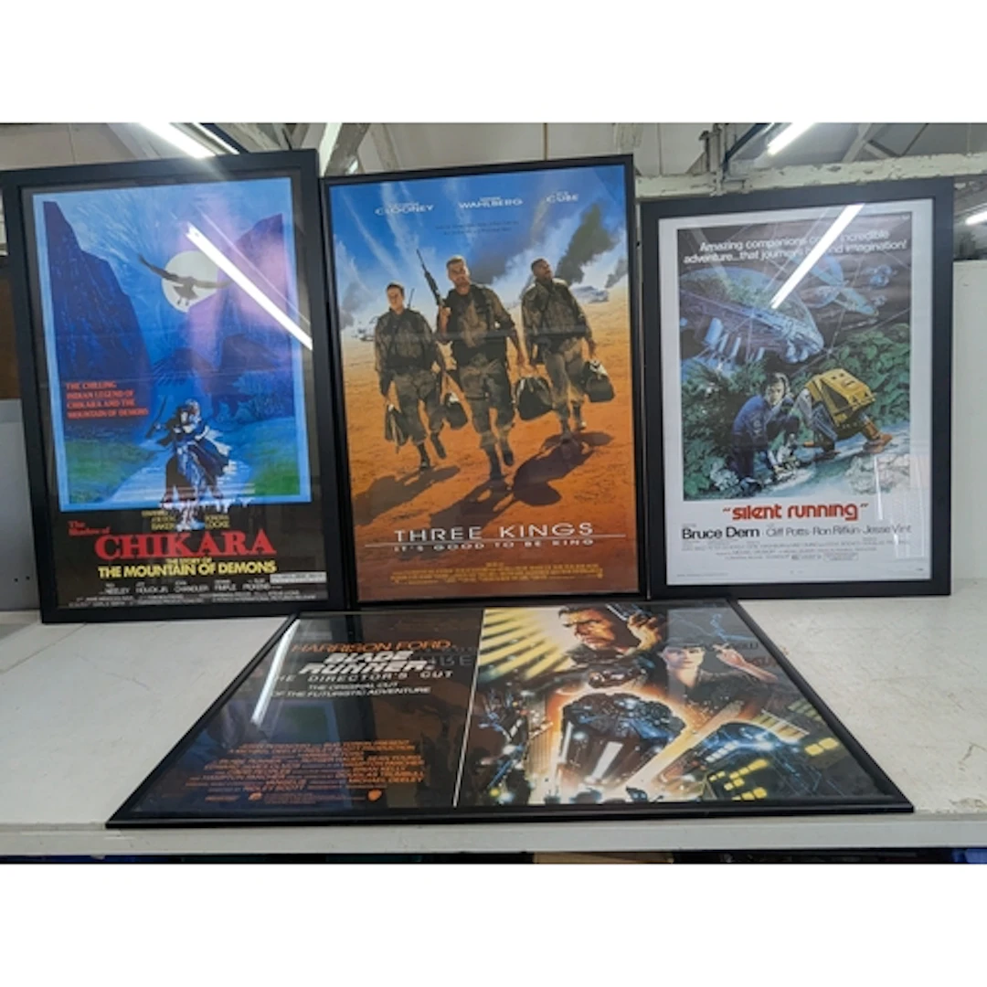 Film posters, a collection of framed and glazed film posters...