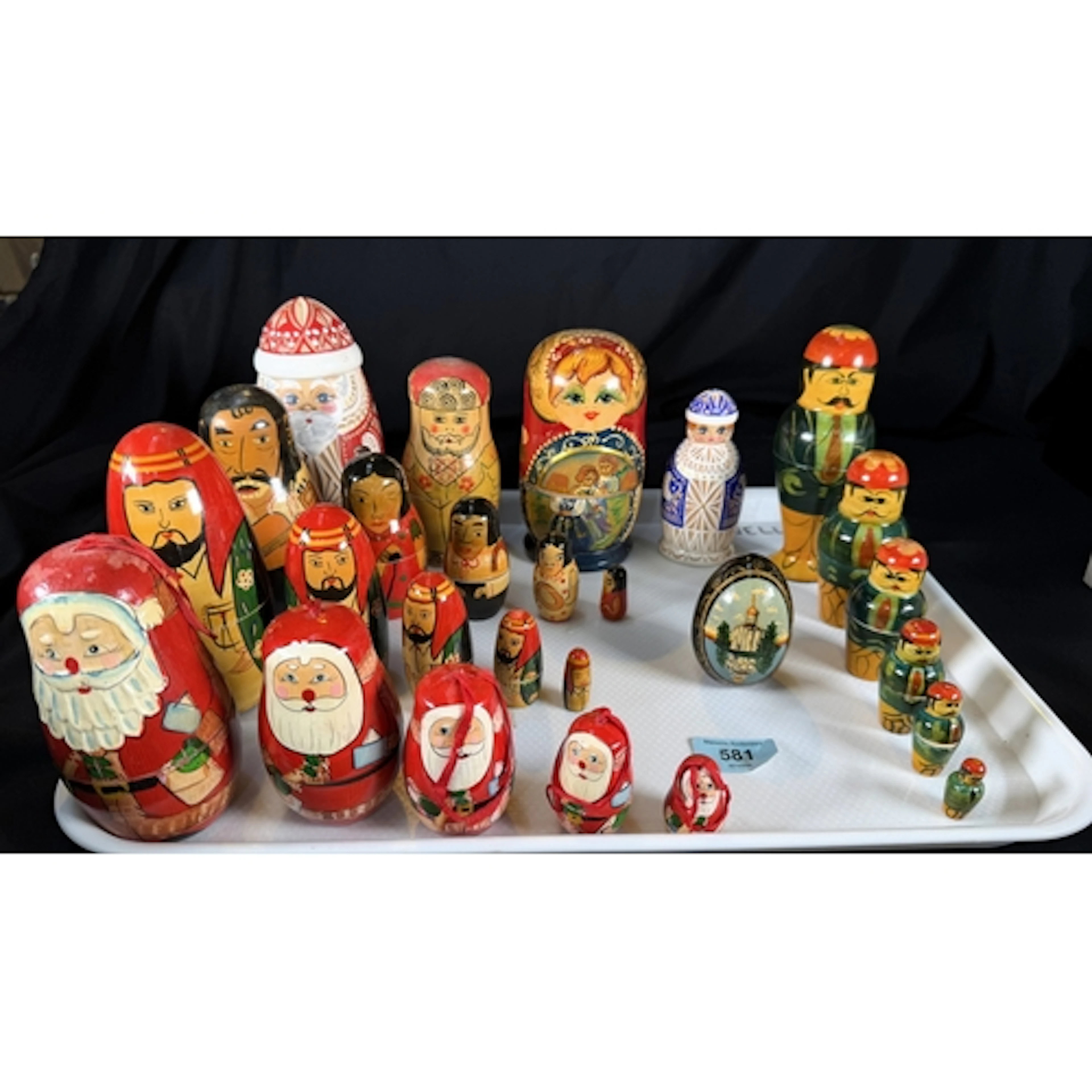 A collection of Russian Matryoshka wooden nests of dolls, Fa...