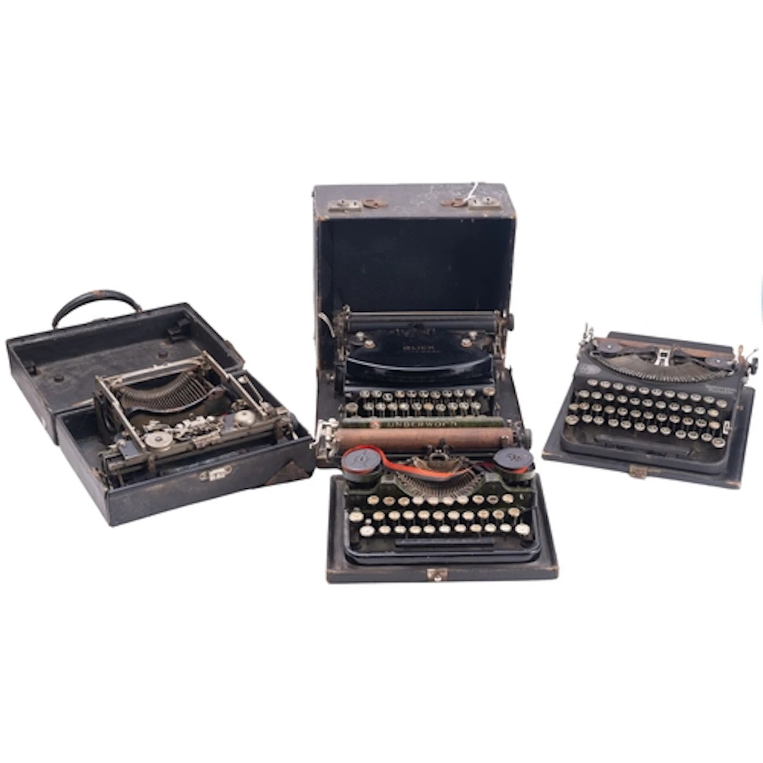 A 20th Century Underwood Standard Portable Typewriter. Toget...