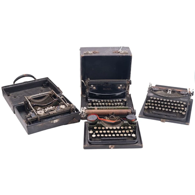 A 20th Century Underwood Standard Portable Typewriter. Toget...