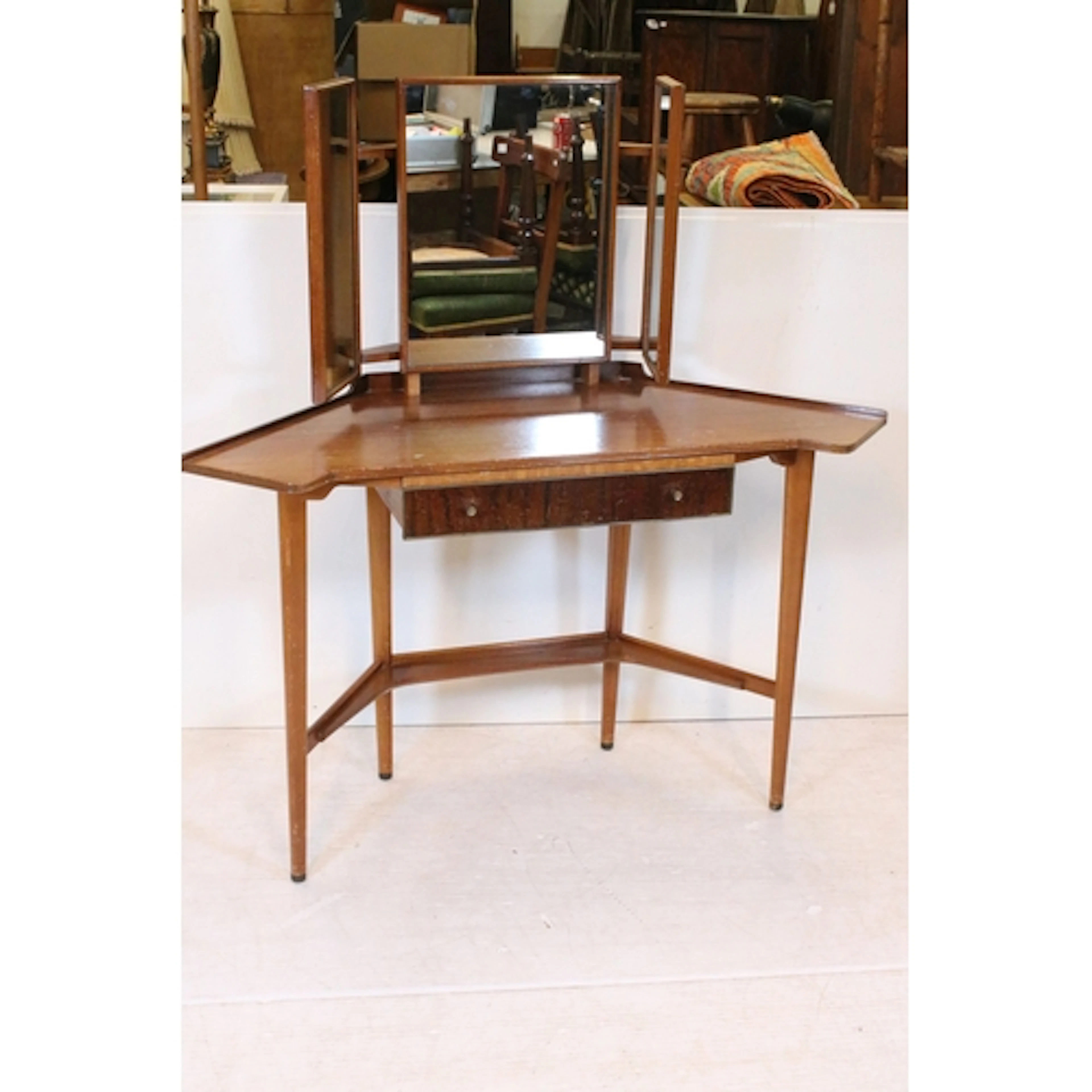 Mid century mahogany dressing table of geometric form, with ...