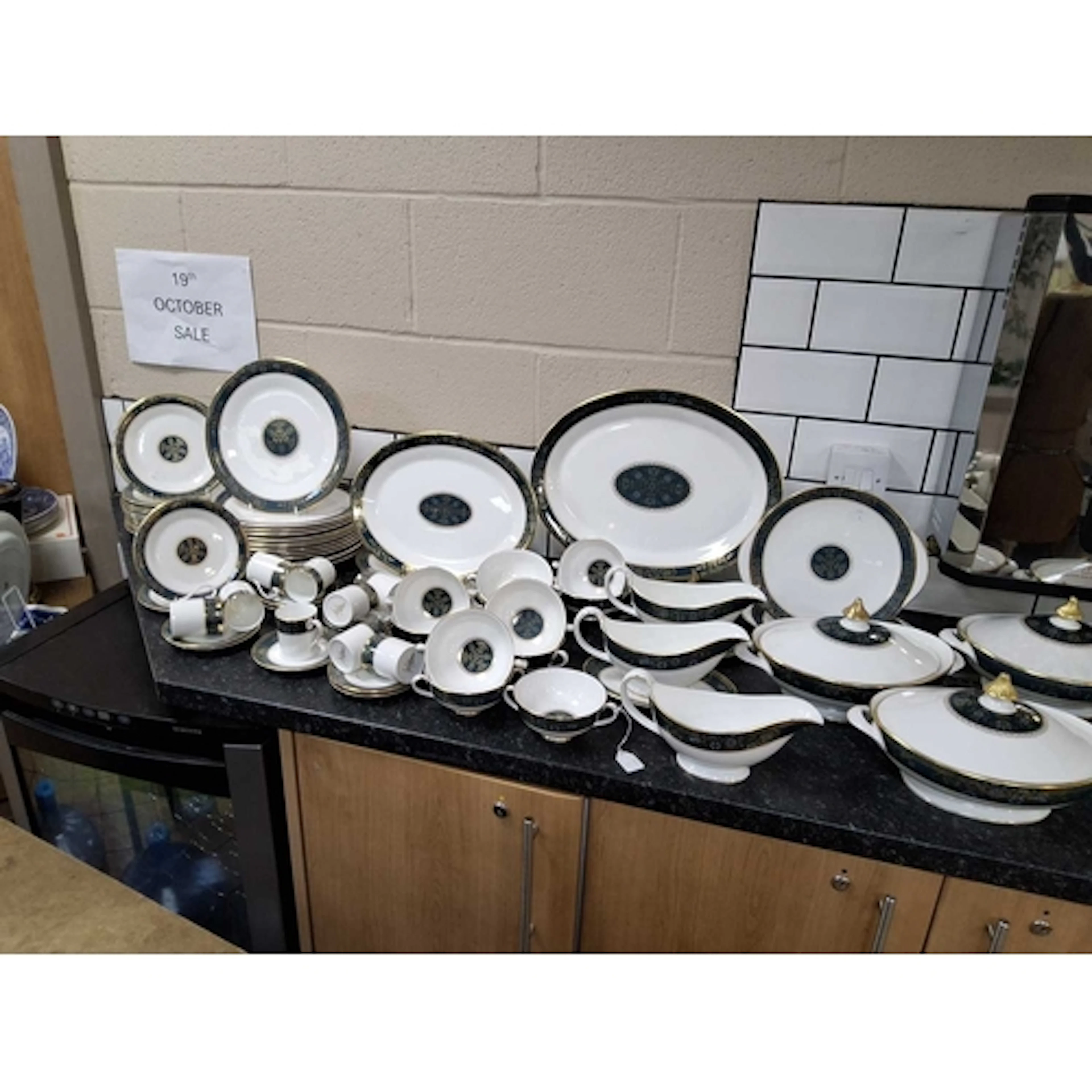 A ROYAL DOULTON 'CARLYLE' PATTERN DINNER SERVICE comprising ...