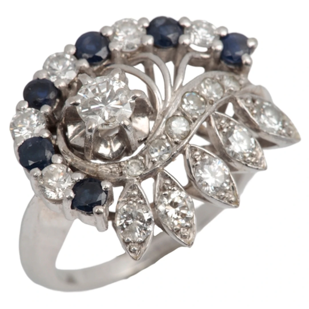 A sapphire and diamond cocktail ring, mid 20th century, desi...