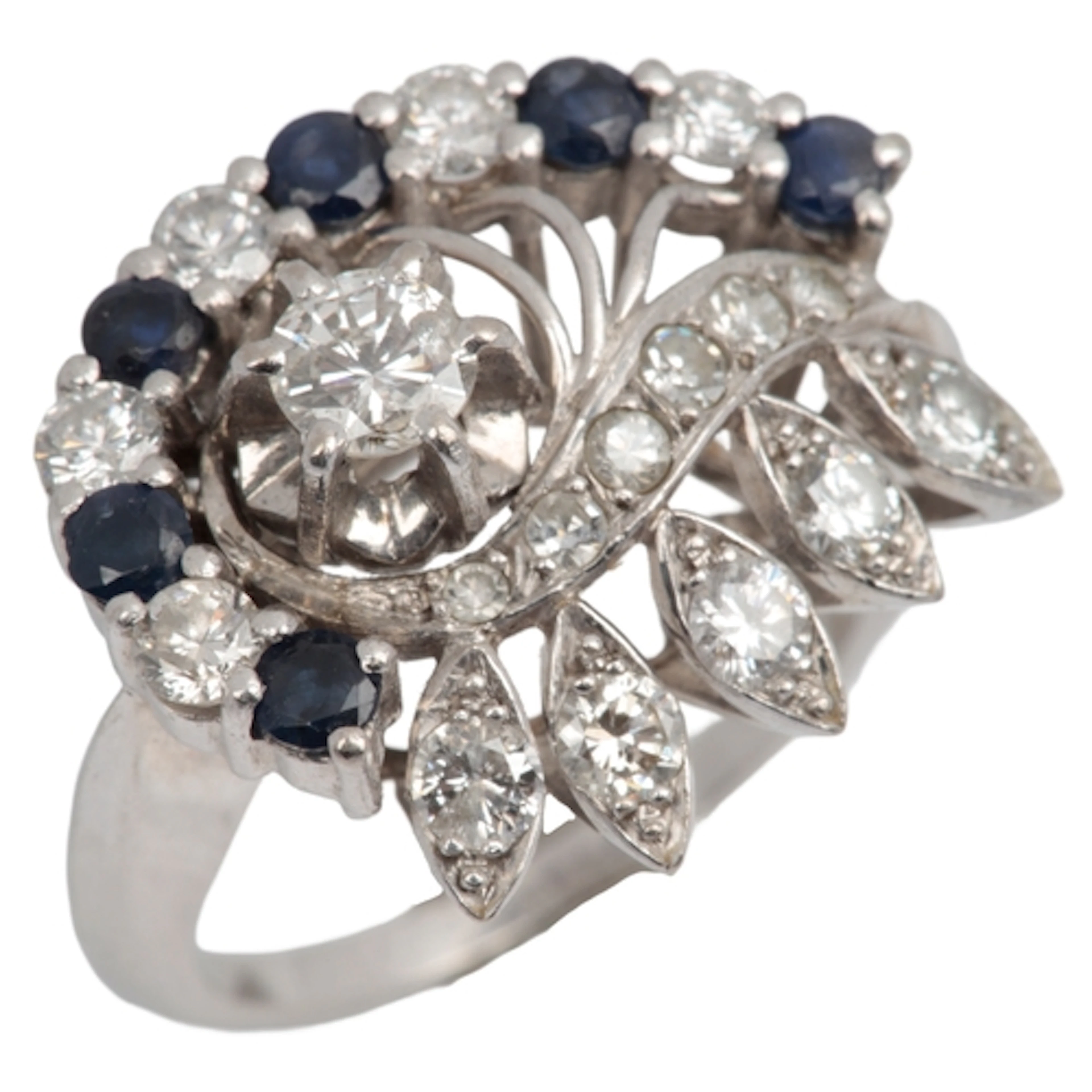 A sapphire and diamond cocktail ring, mid 20th century, desi...