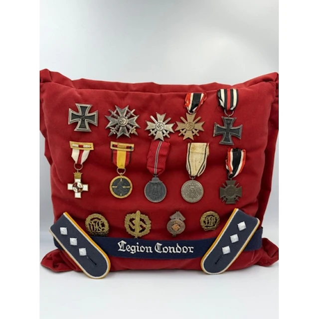 The Medals, photos and civilian internment documentation for...