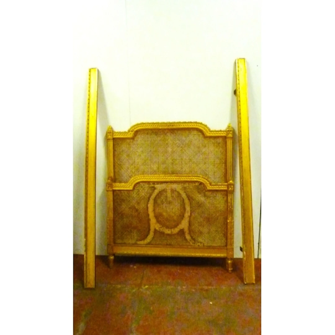 Pair of Louis XVI design giltwood and bergere single bed end...