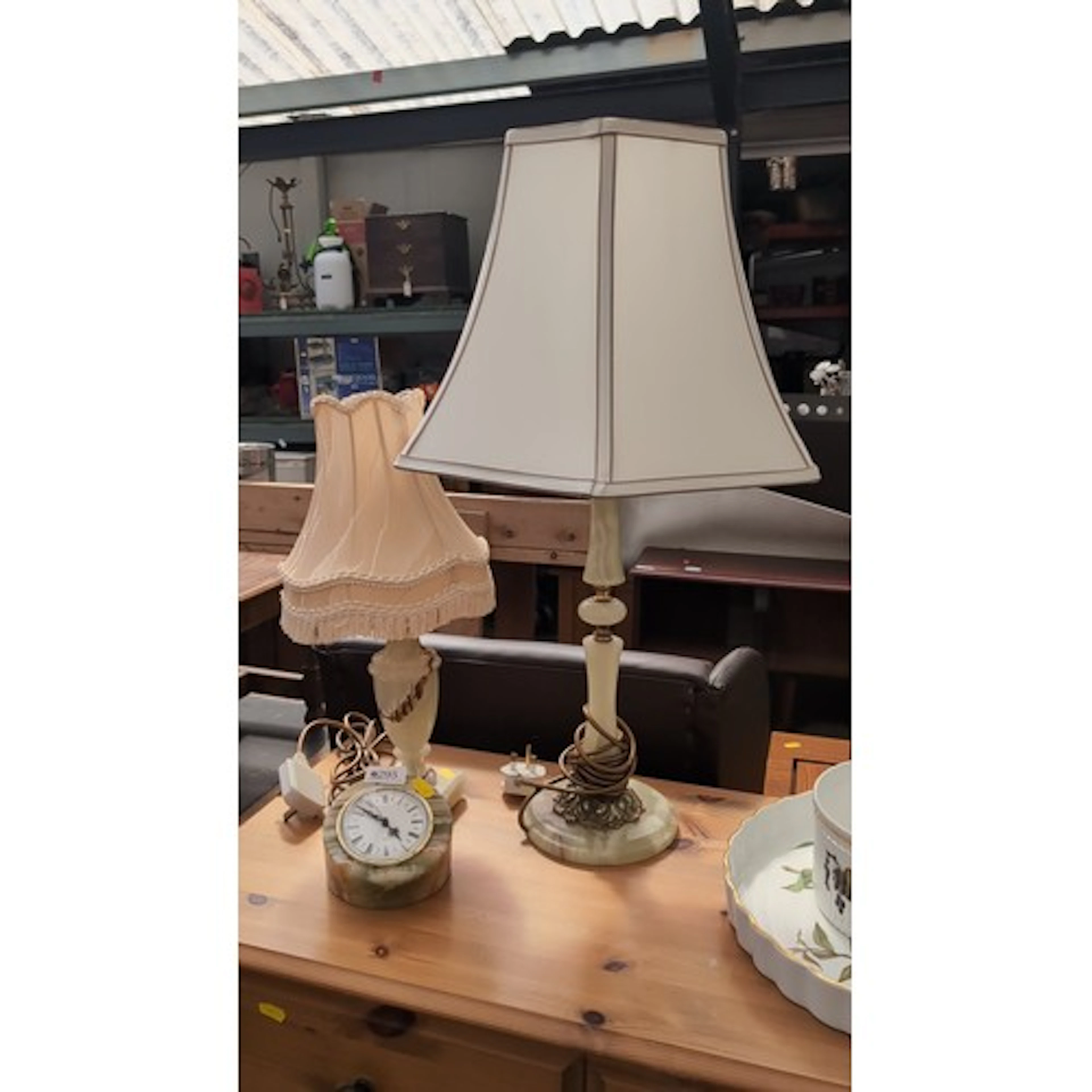 Two table lamps with onyx bases and baluster stems, one with...