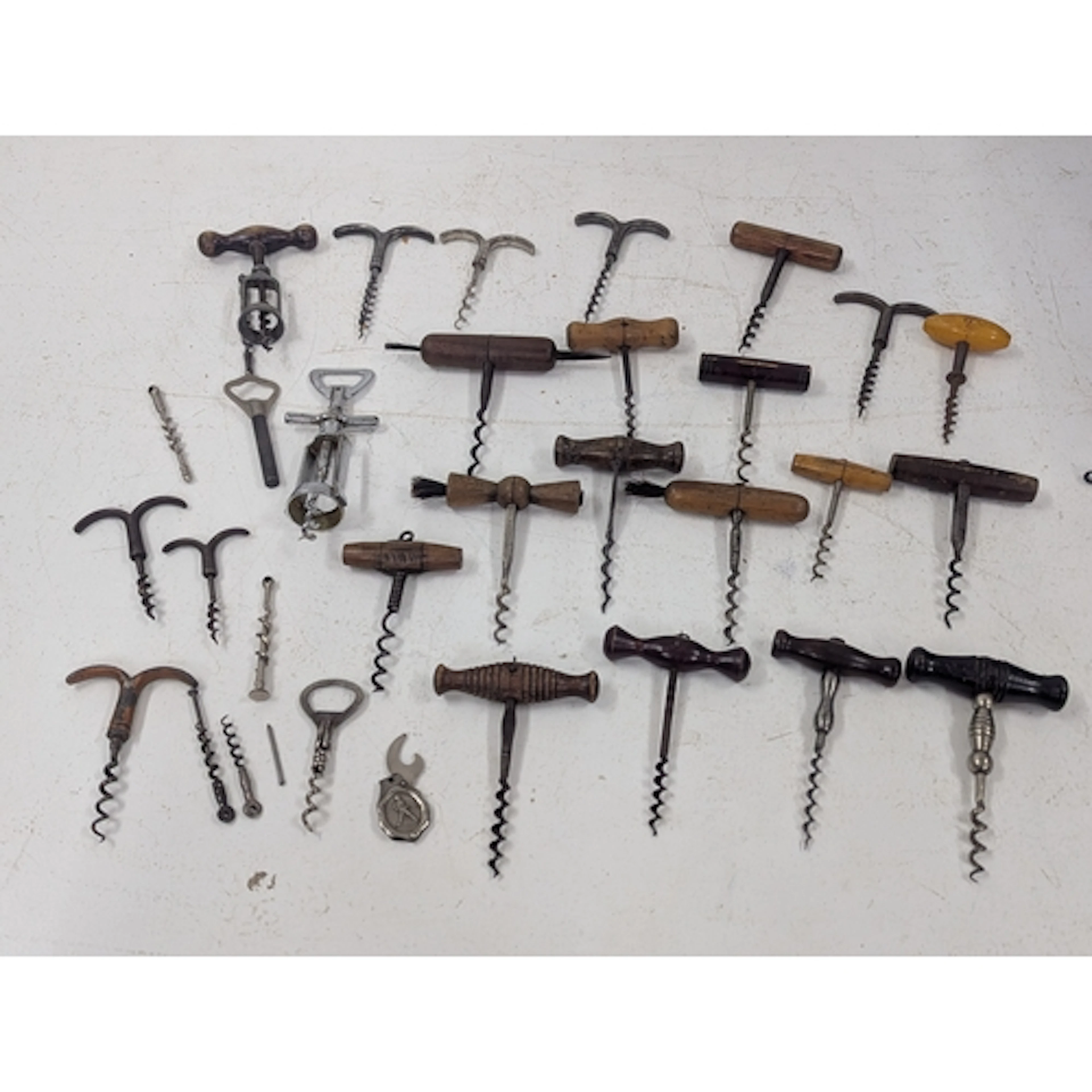 A collection of late 19th century corkscrews to include T-ba...