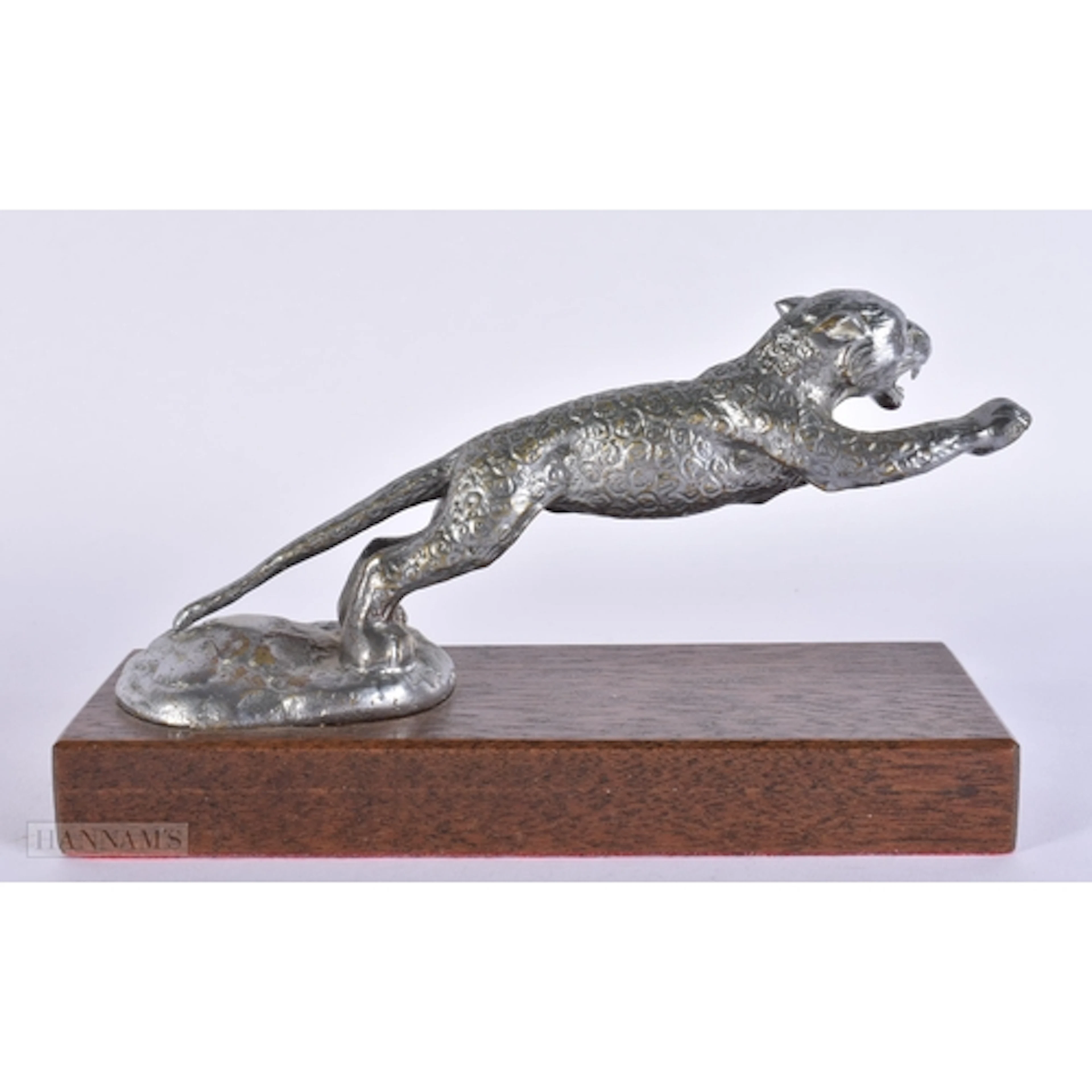 A DESMO JAGUAR CAR MASCOT. 20 cm wide.