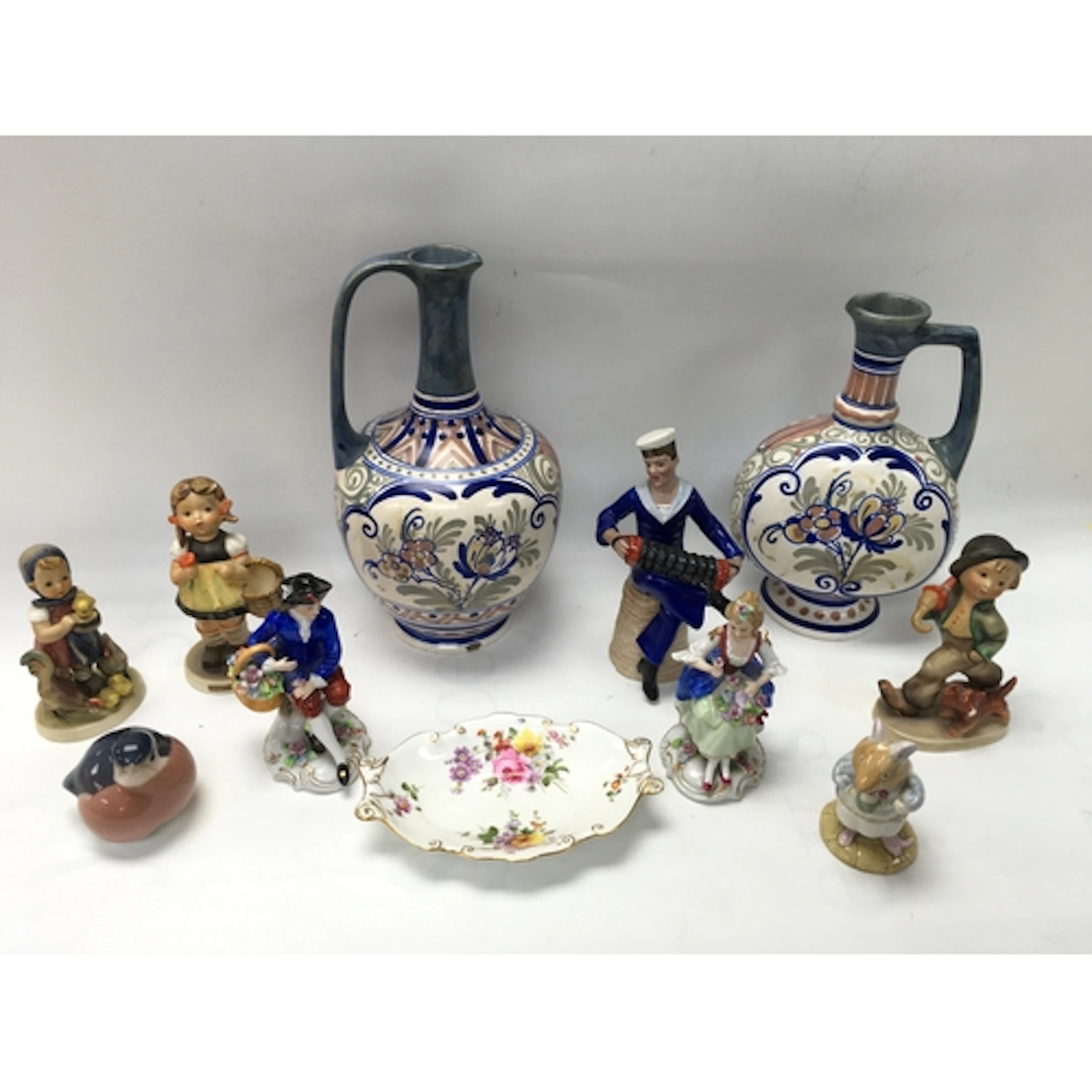 A small collection of ceramics including Gouda jugs and a Dr...
